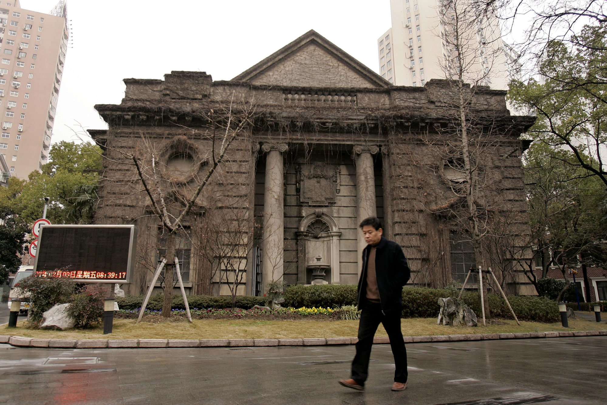 A man walks past the Ohel Rachel Synagogue in Shanghai which was built in 1920. Photo: AP