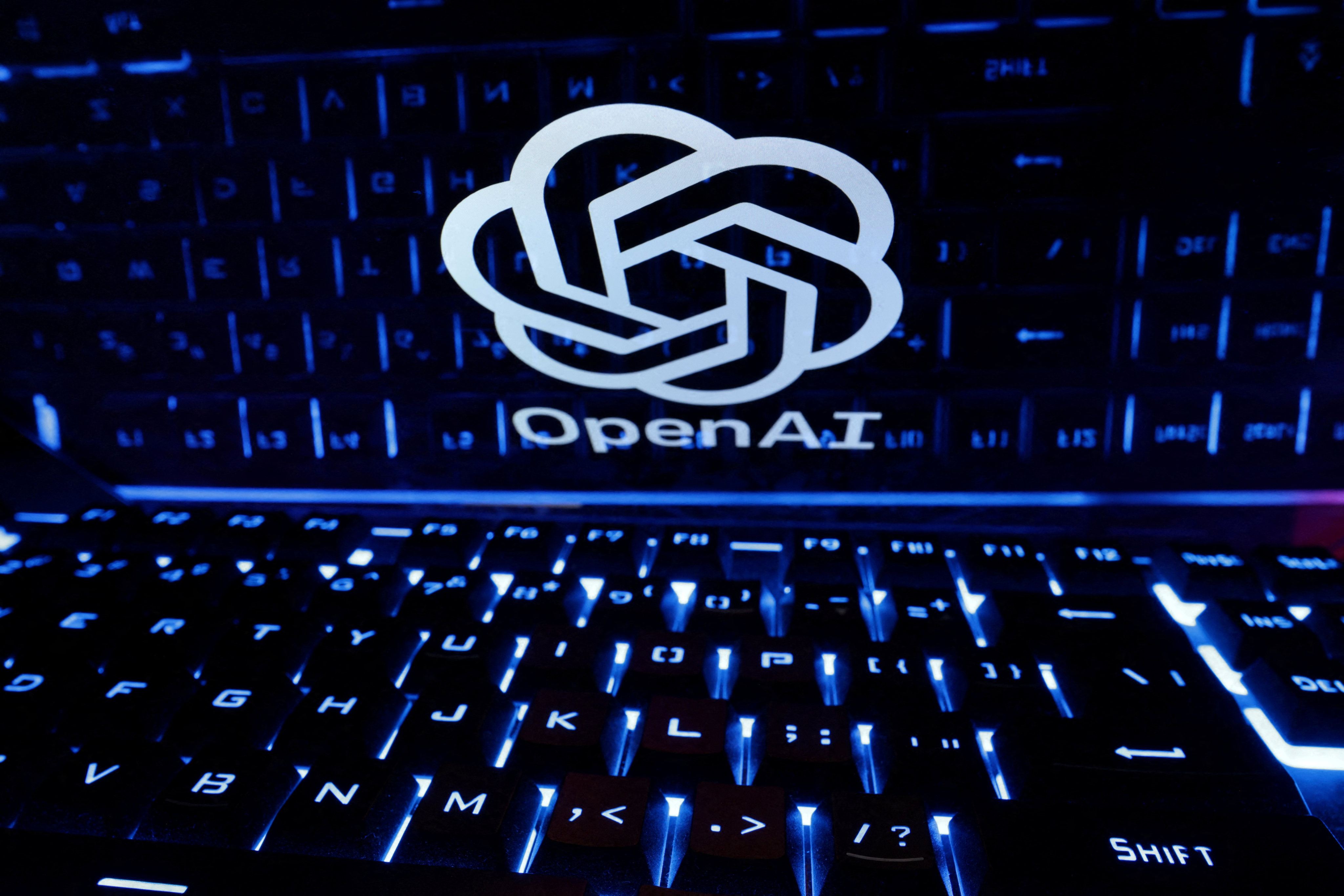 A keyboard is placed in front of a displayed OpenAI logo in this illustration taken February 21, 2023. Photo: Reuters