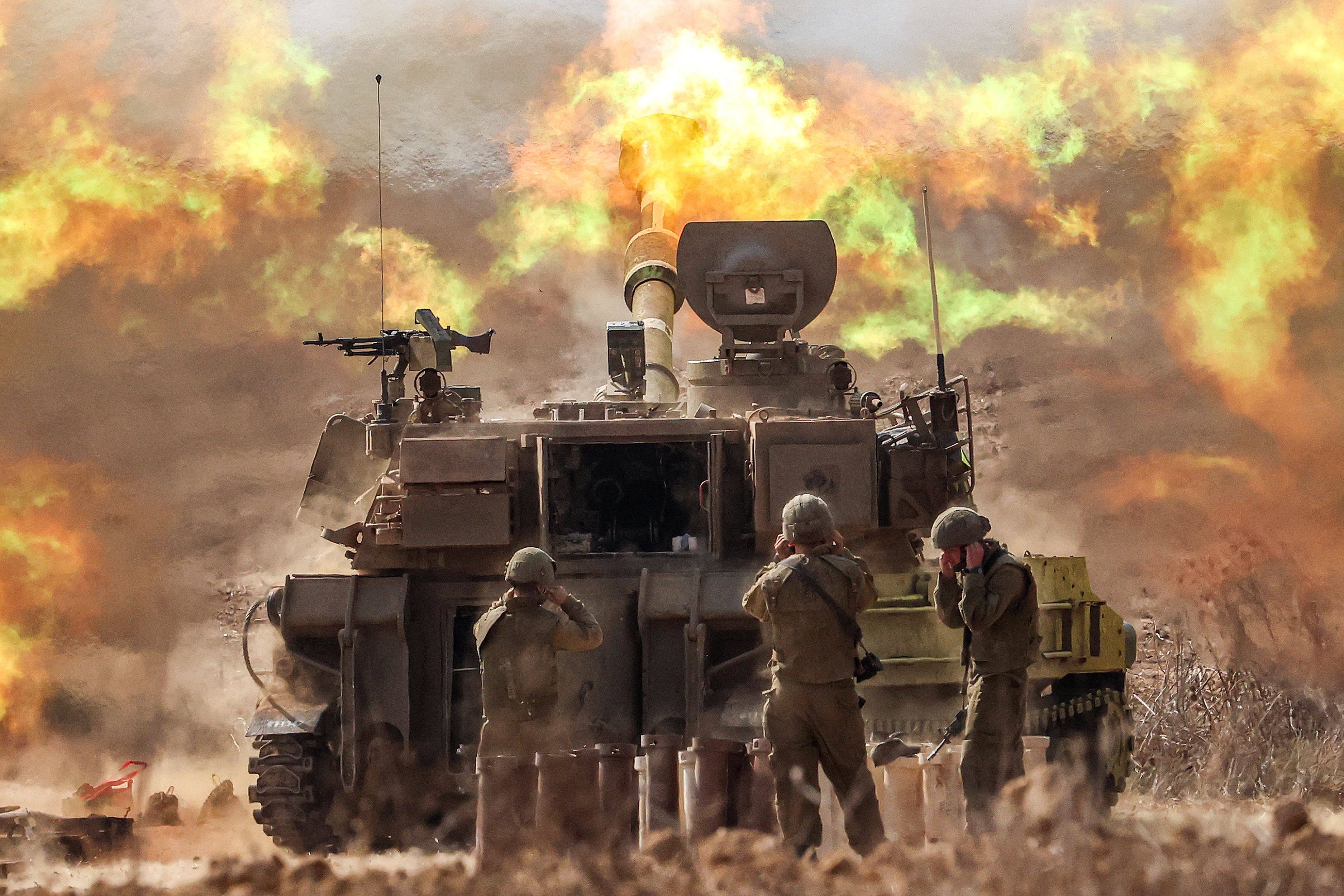 An Israeli army self-propelled howitzer fires rounds near the border with Gaza in southern Israel. Photo: AFP