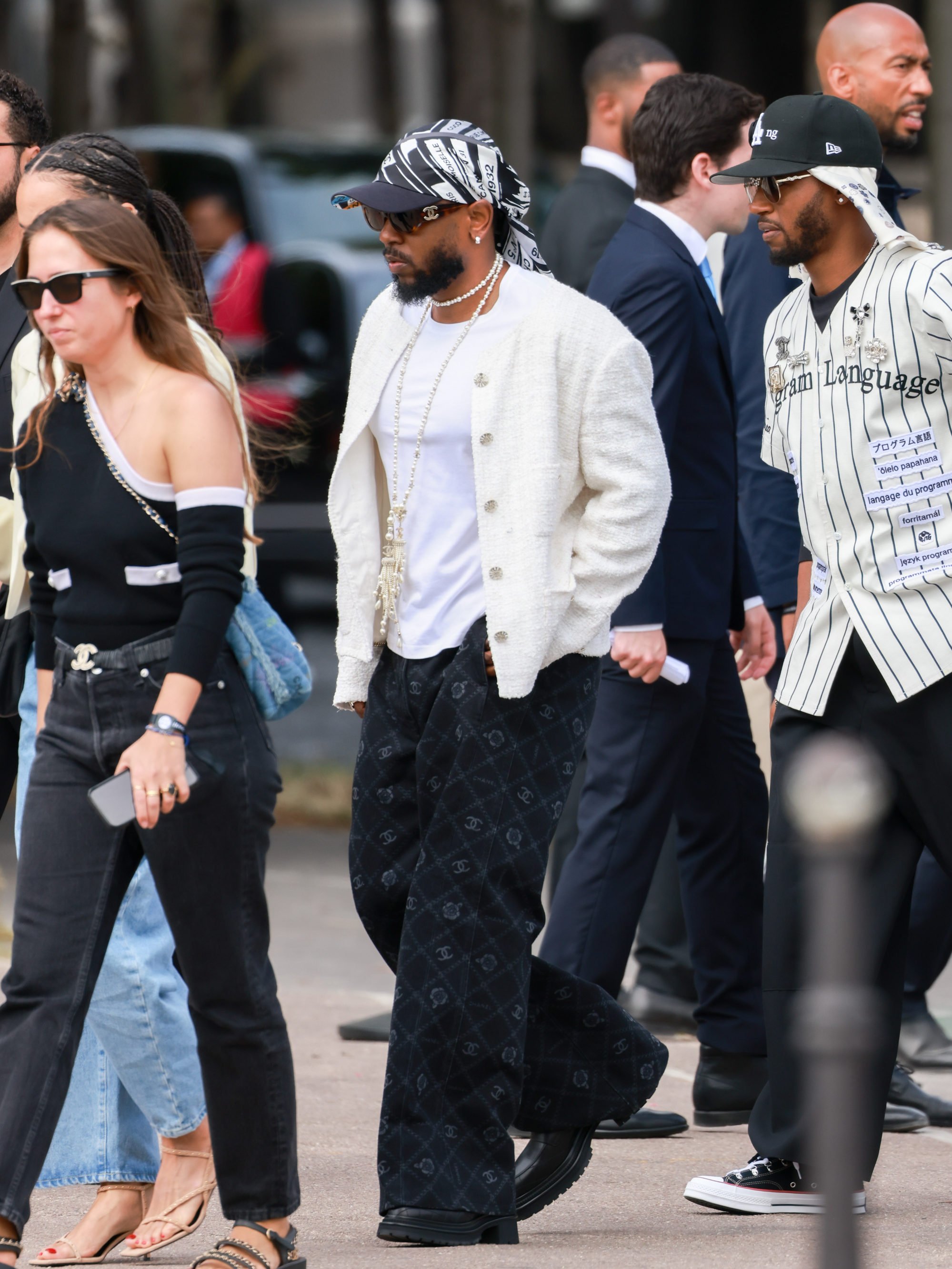 Kendrick Lamar is wearin a full Chanel outfit during Couture