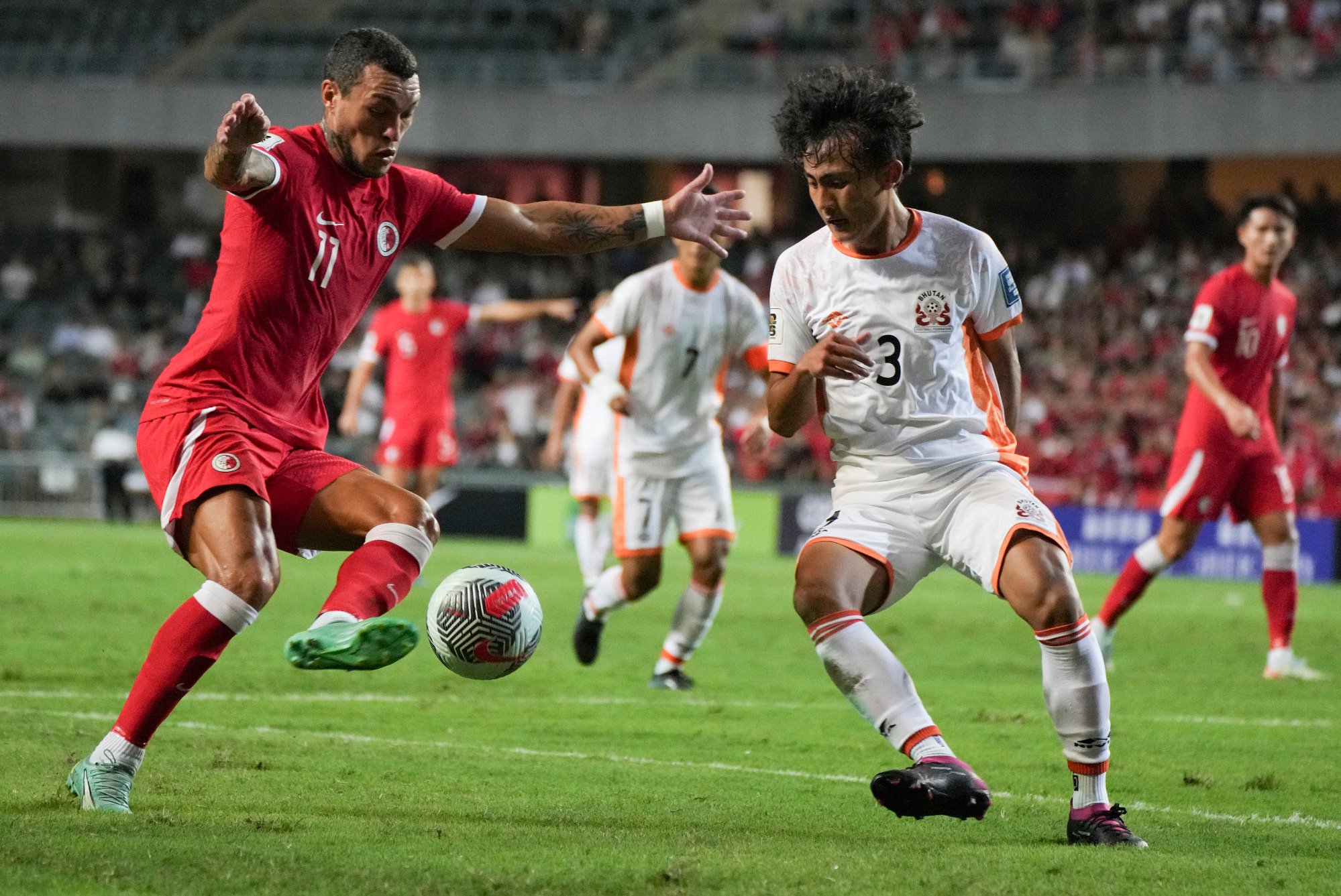 Hong Kong striker Everton Camargo (left) has been ruled out of the second leg against Bhutan with a knee injury. Photo: Elson Li