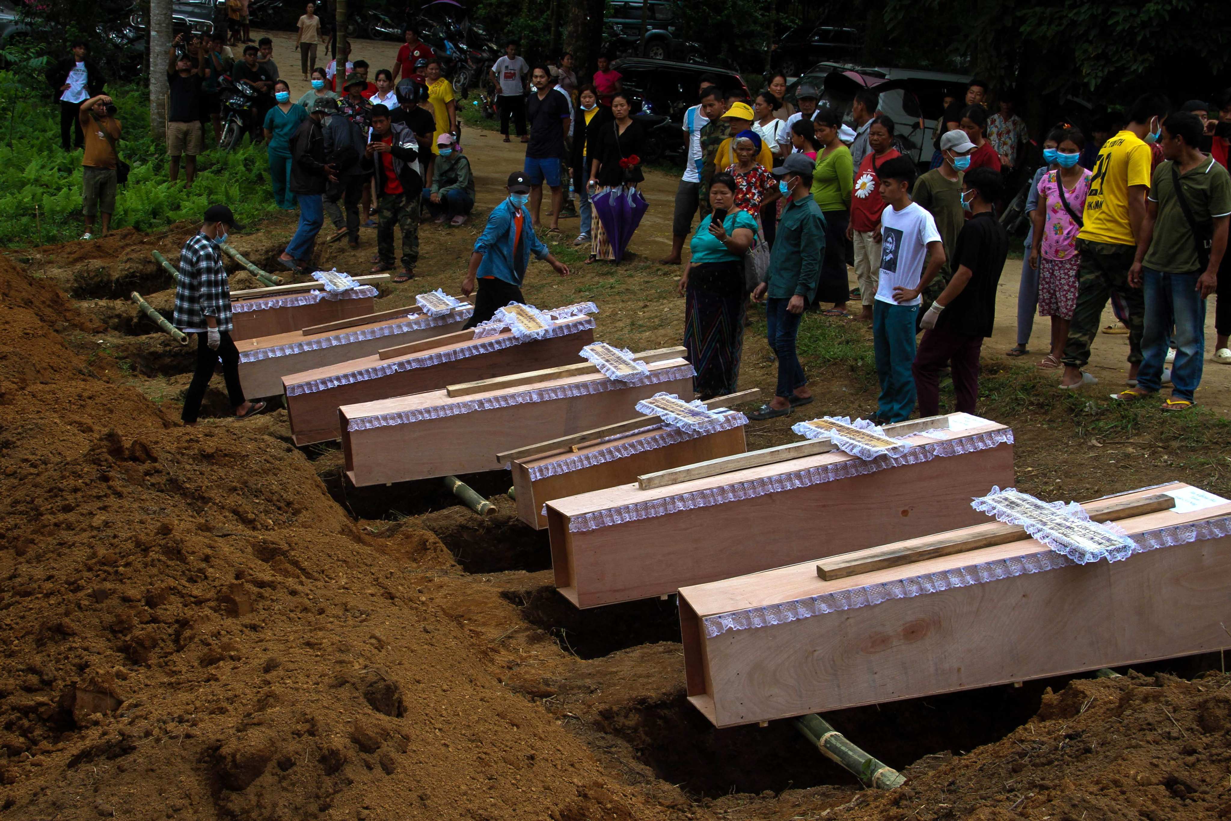 A mass funeral to bury victims of a military strike on a camp for displaced people near the northern Myanmar town of Laiza. Photo: AFP