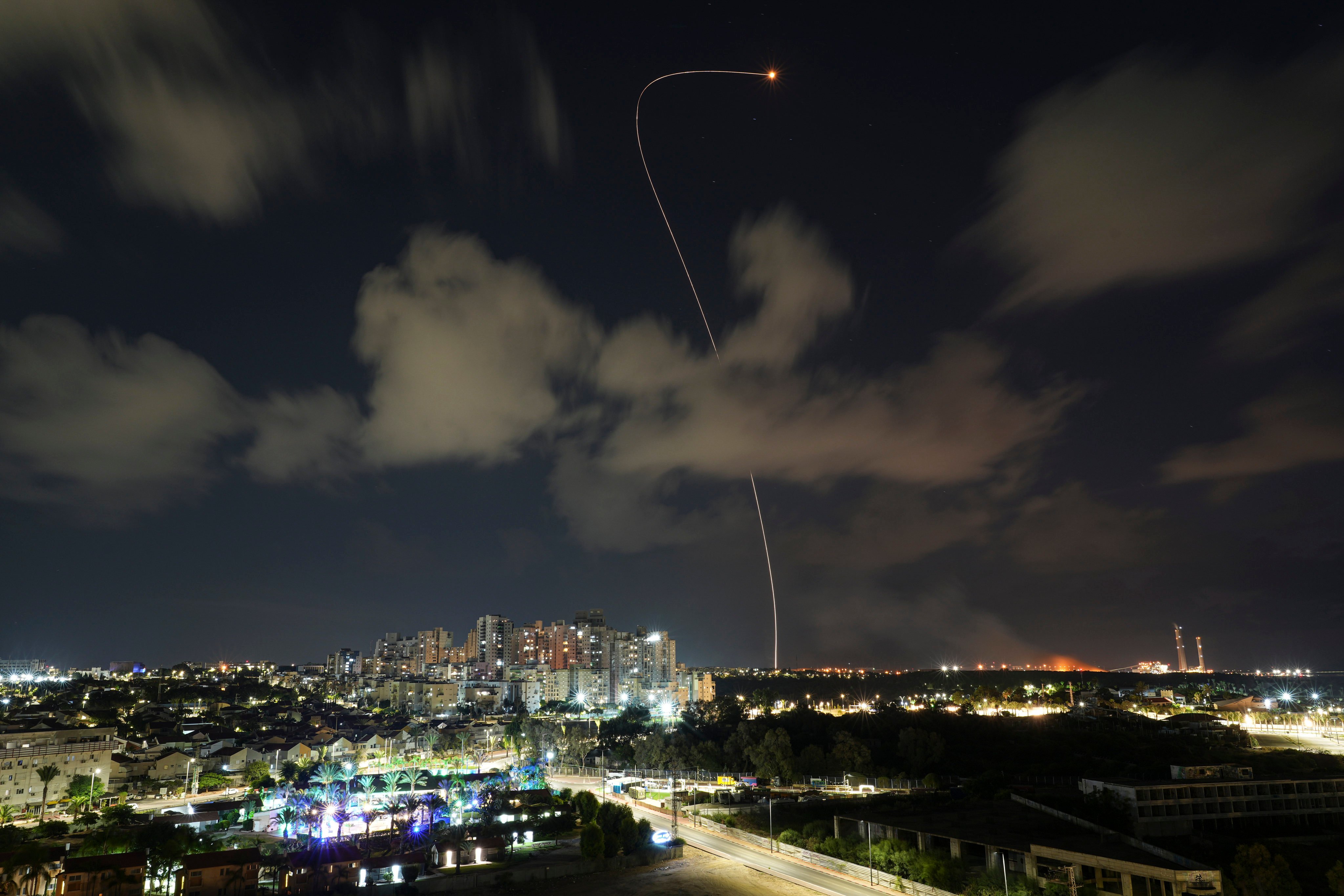 Israel’s Iron Dome air defence system fires to intercept a rocket fired from the Gaza Strip in Ashkelon, Israel, on Friday. Photo: AP