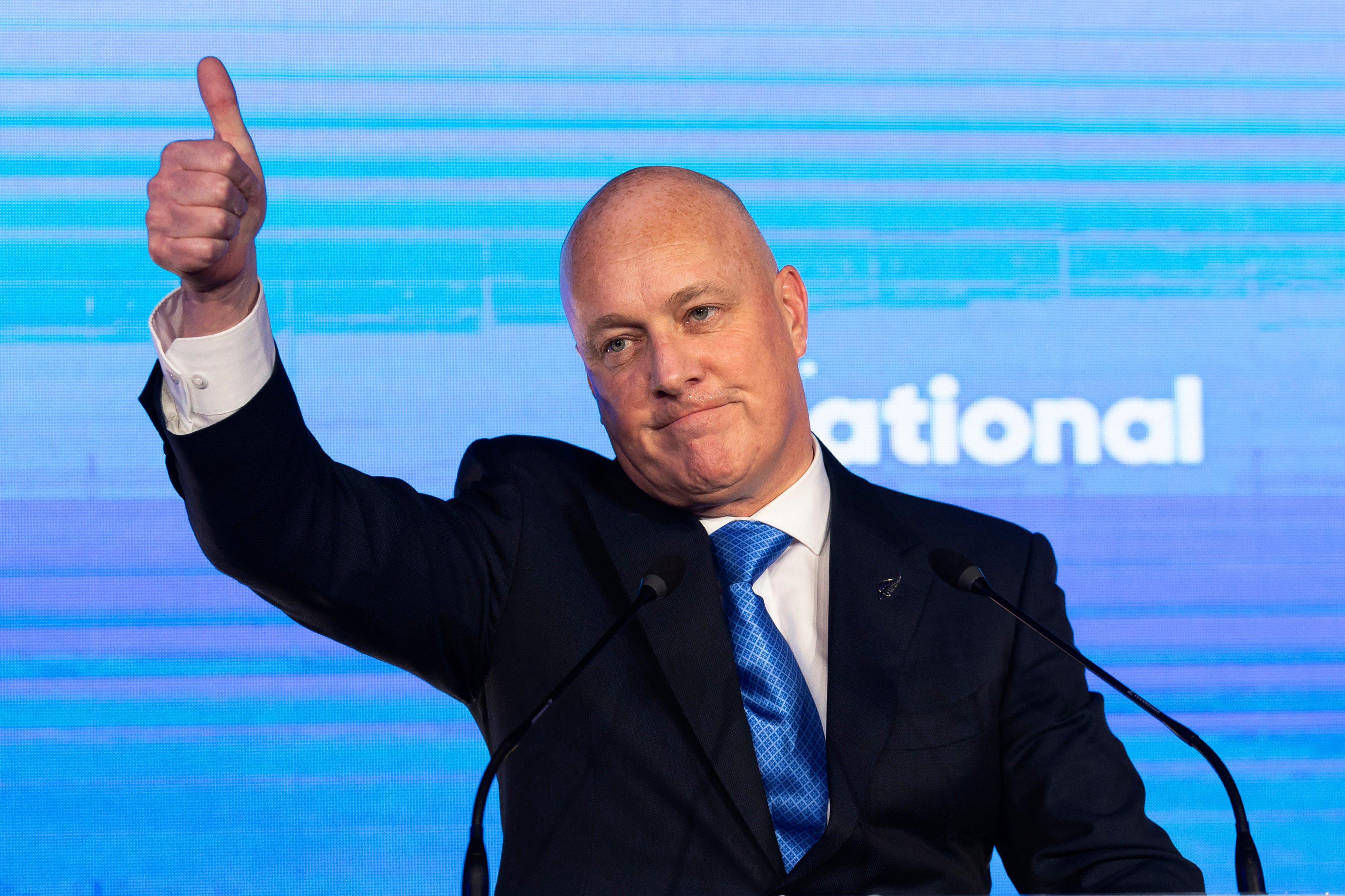 New Zealand National Party leader and Prime Minister elect Christopher Luxon gestures to supporters. Photo: AP