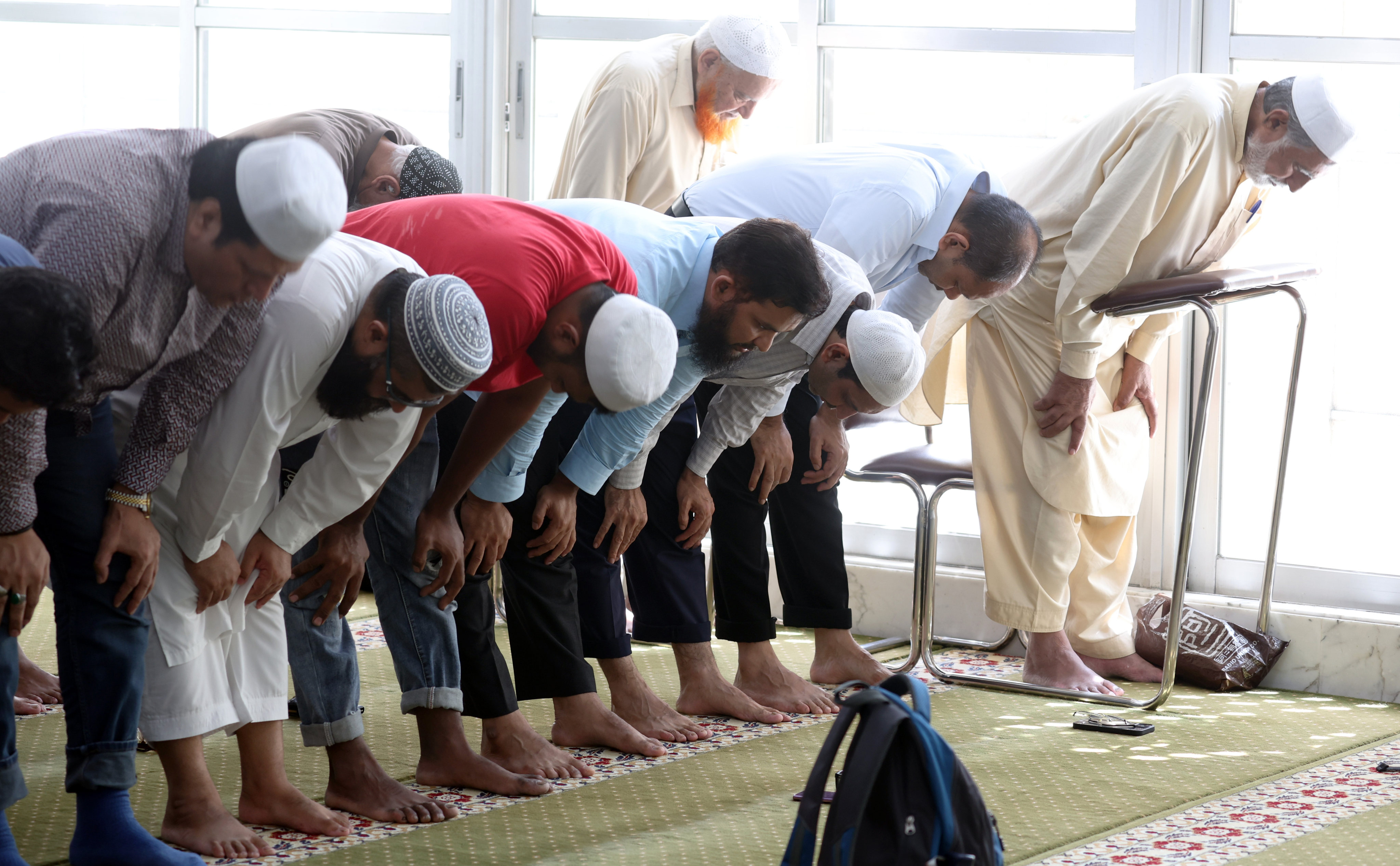 Believers pray at Kowloon Mosque in Tsim Sha Tsui. Jewish and Muslim communities are finding ways to send aid to friends and family back home. Photo: Yik Yeung-man