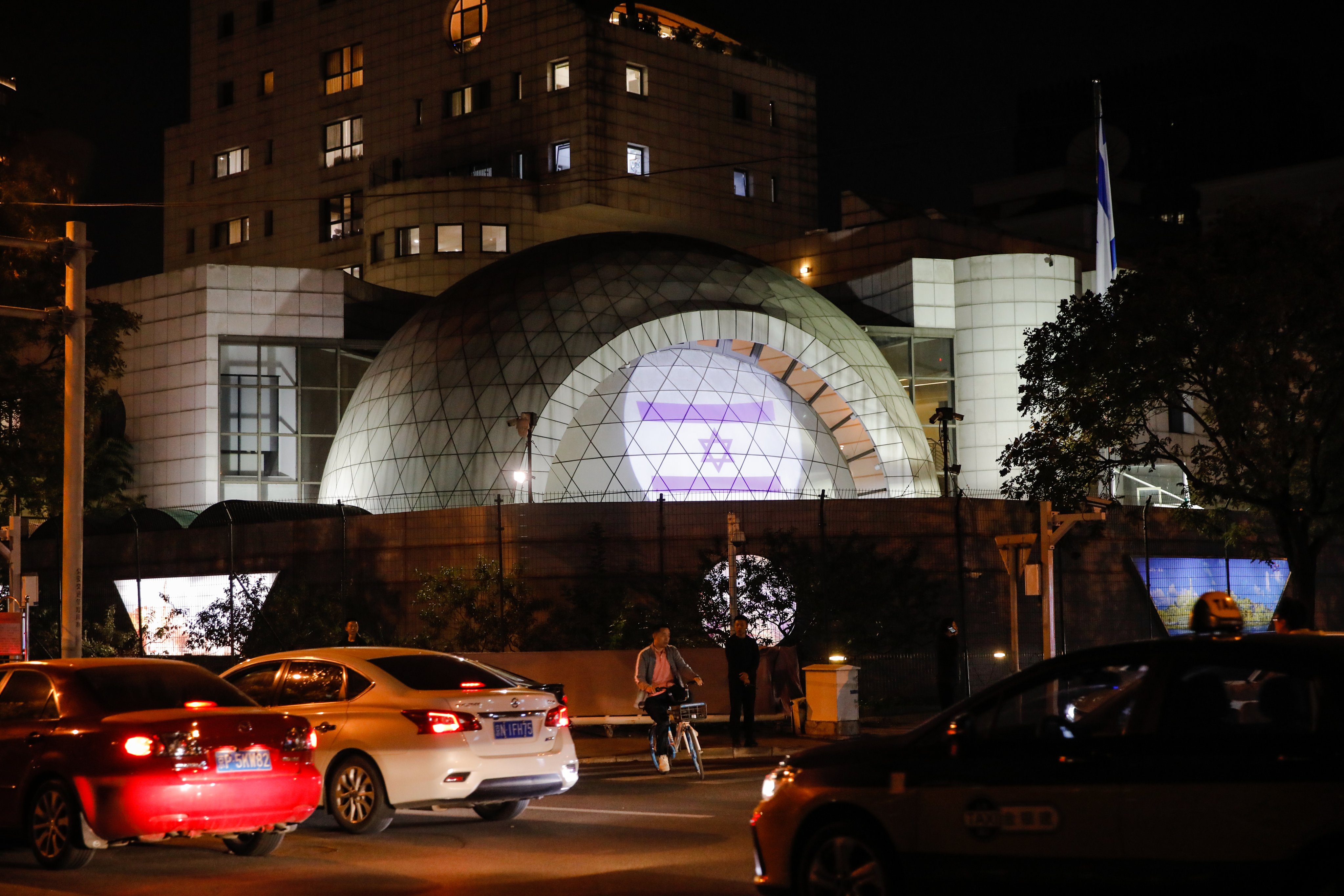 The Israeli embassy in Beijing is lit up with the country’s flag bearing the Star of David on Friday. Photo: EPA-EFE