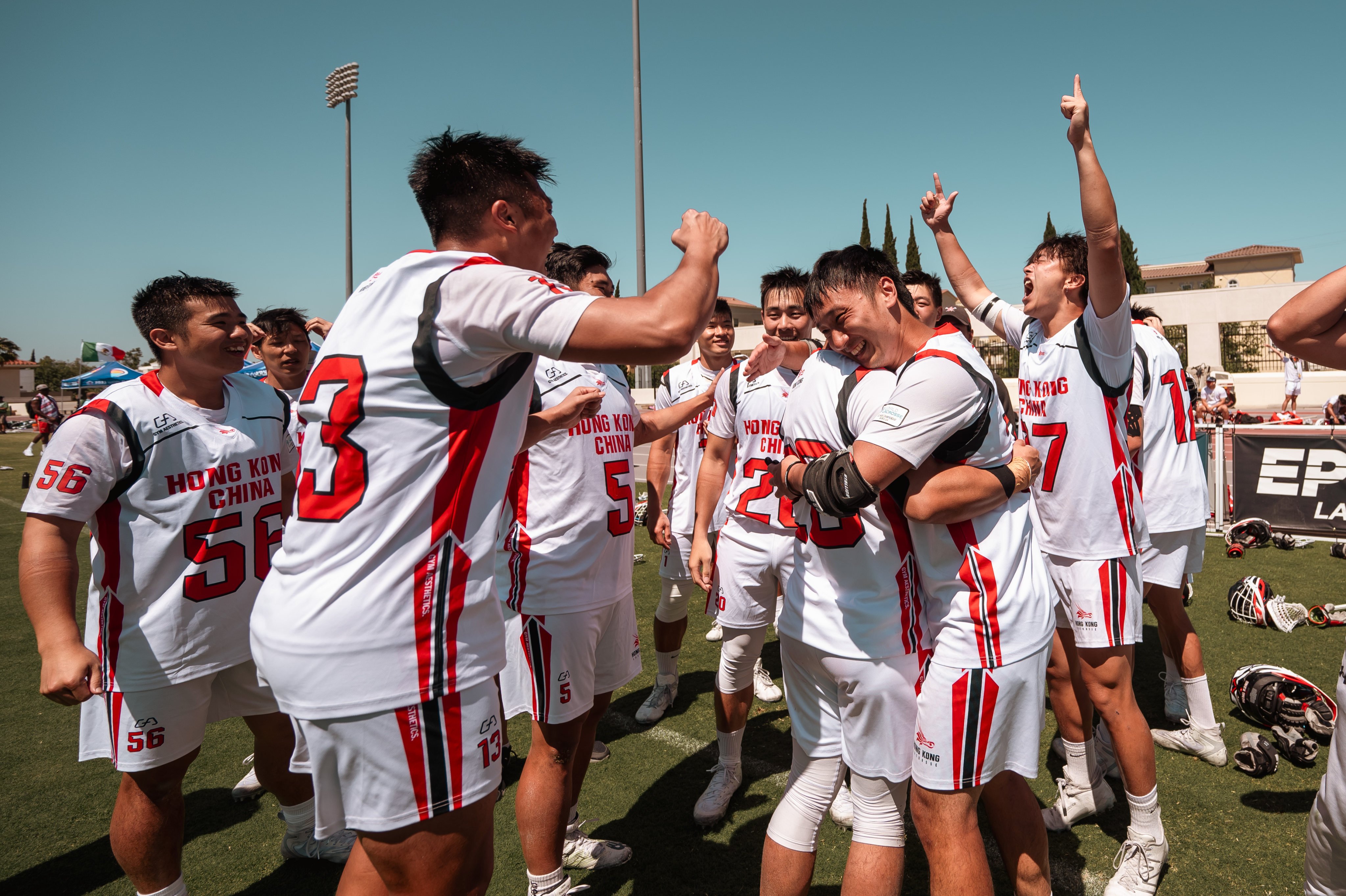Hong Kong’s lacrosse players celebrate reaching the main play-offs bracket at July’s World Championships. Photo: Handout 