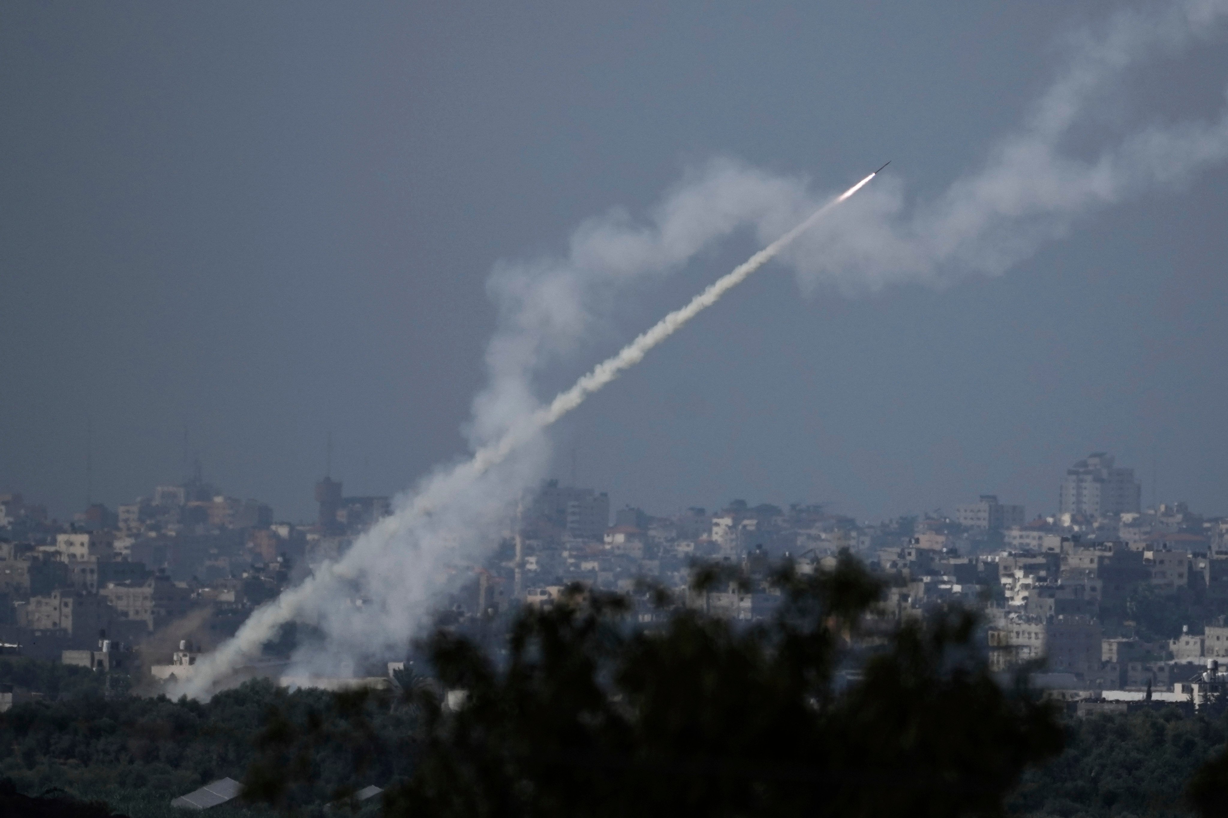 Rockets being fired toward Israel from the Gaza Strip, as seen from southern Israel, on Monday. Photo: AP