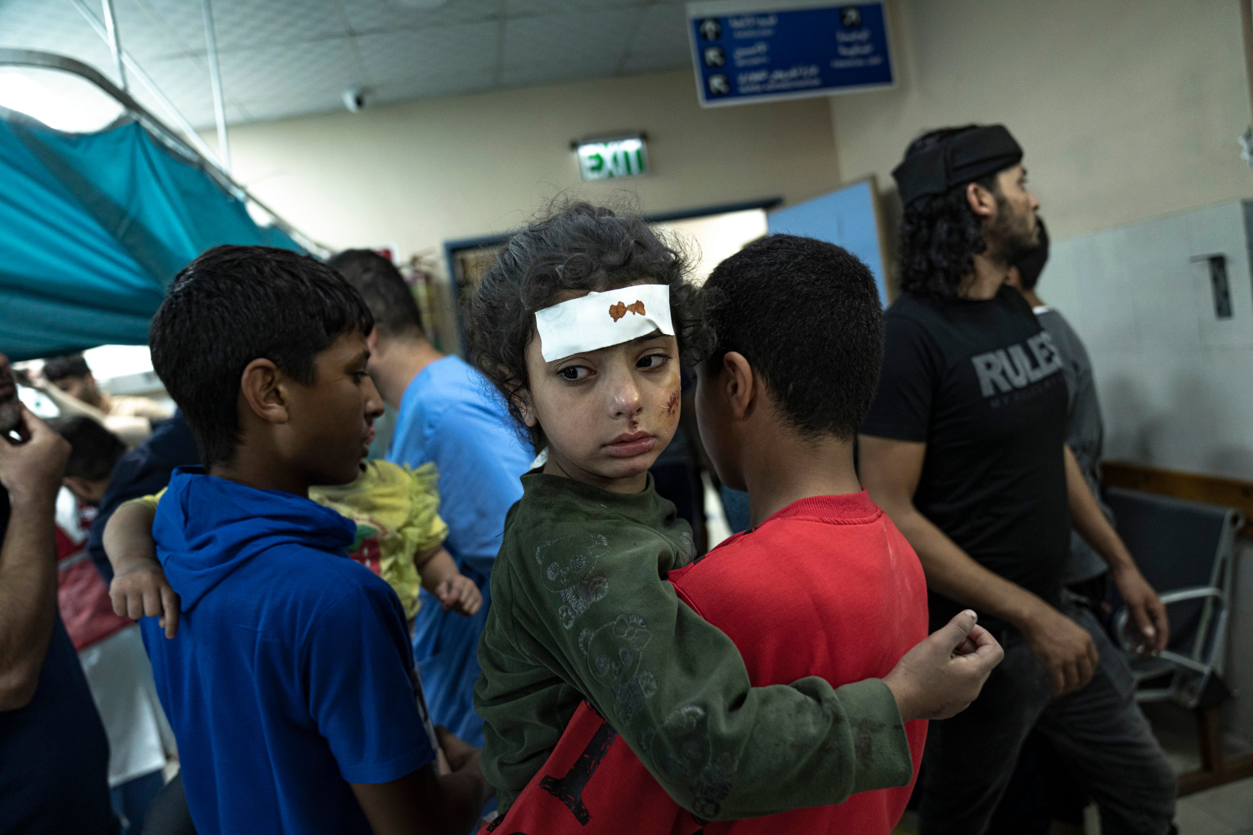 Palestinians wounded in Israeli bombardment of the Gaza Strip arrive at a hospital in Khan Younis on Monday. Photo: AP