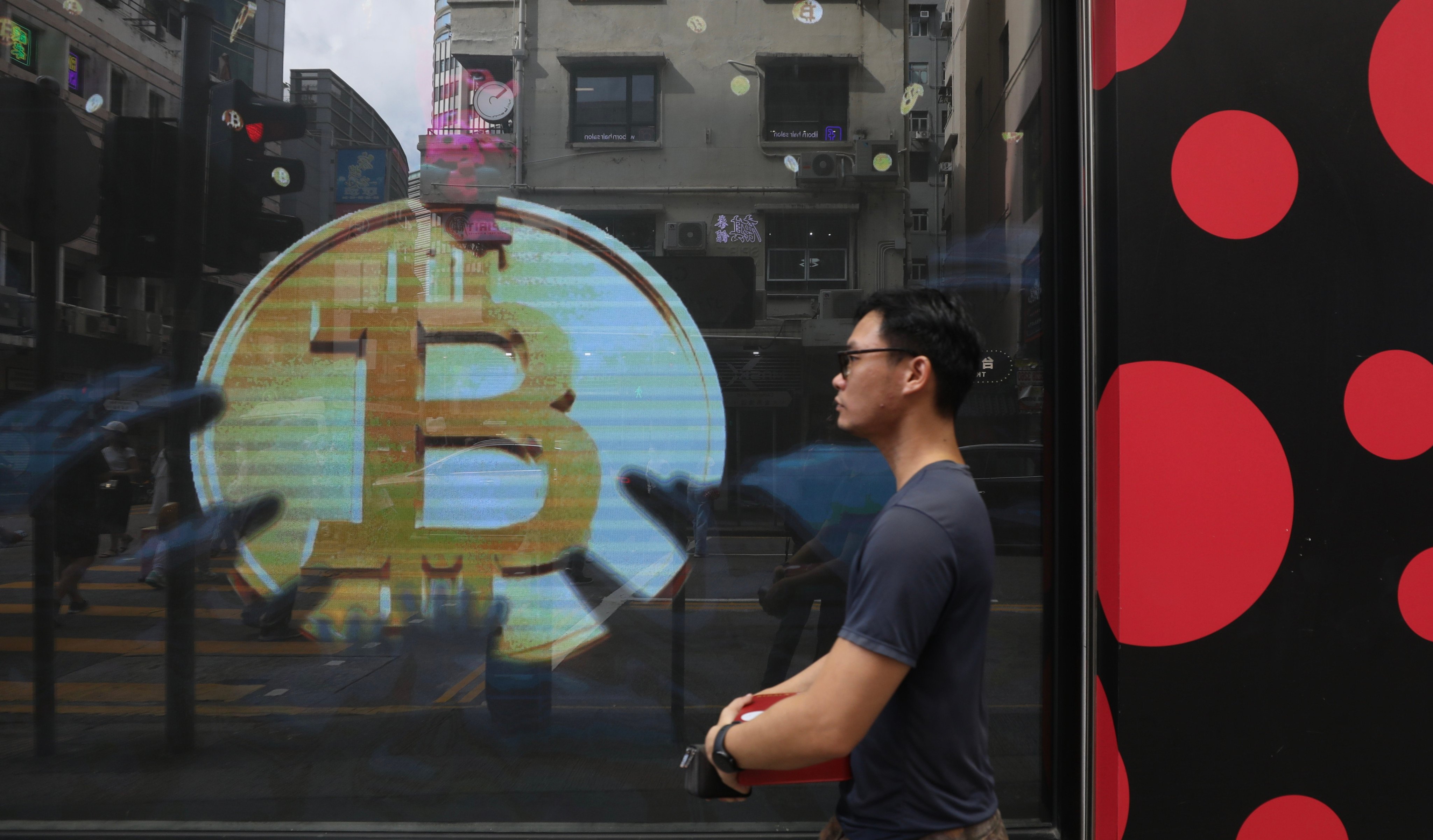 A shop advertising cryptocurrency learning in Hong Kong. Photo: Xiaomei Chen