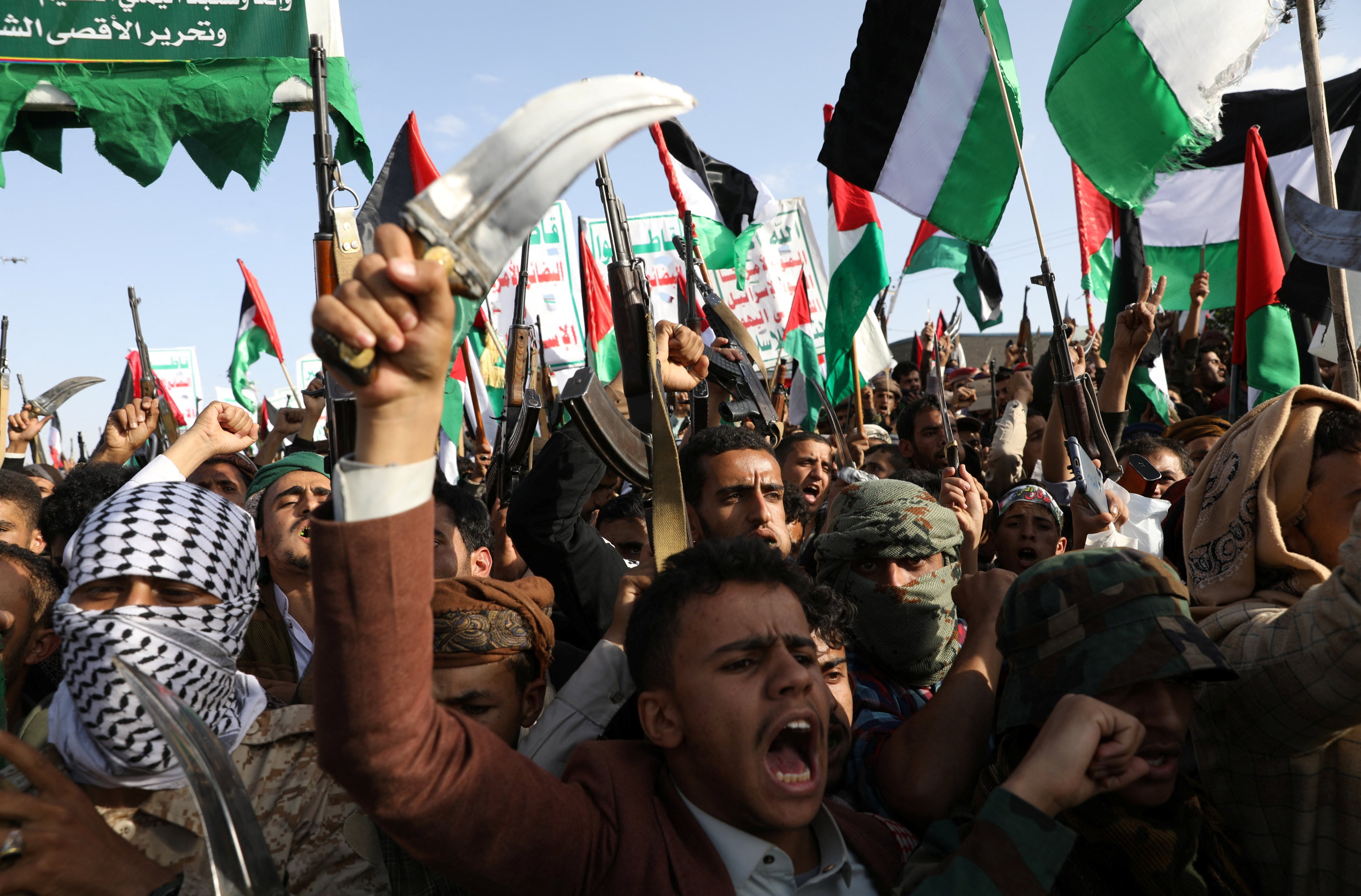 Demonstrators in Yemen carry weapons as they protest in support of Palestinians in Gaza as the conflict between Israel and Hamas continues. Photo: Reuters