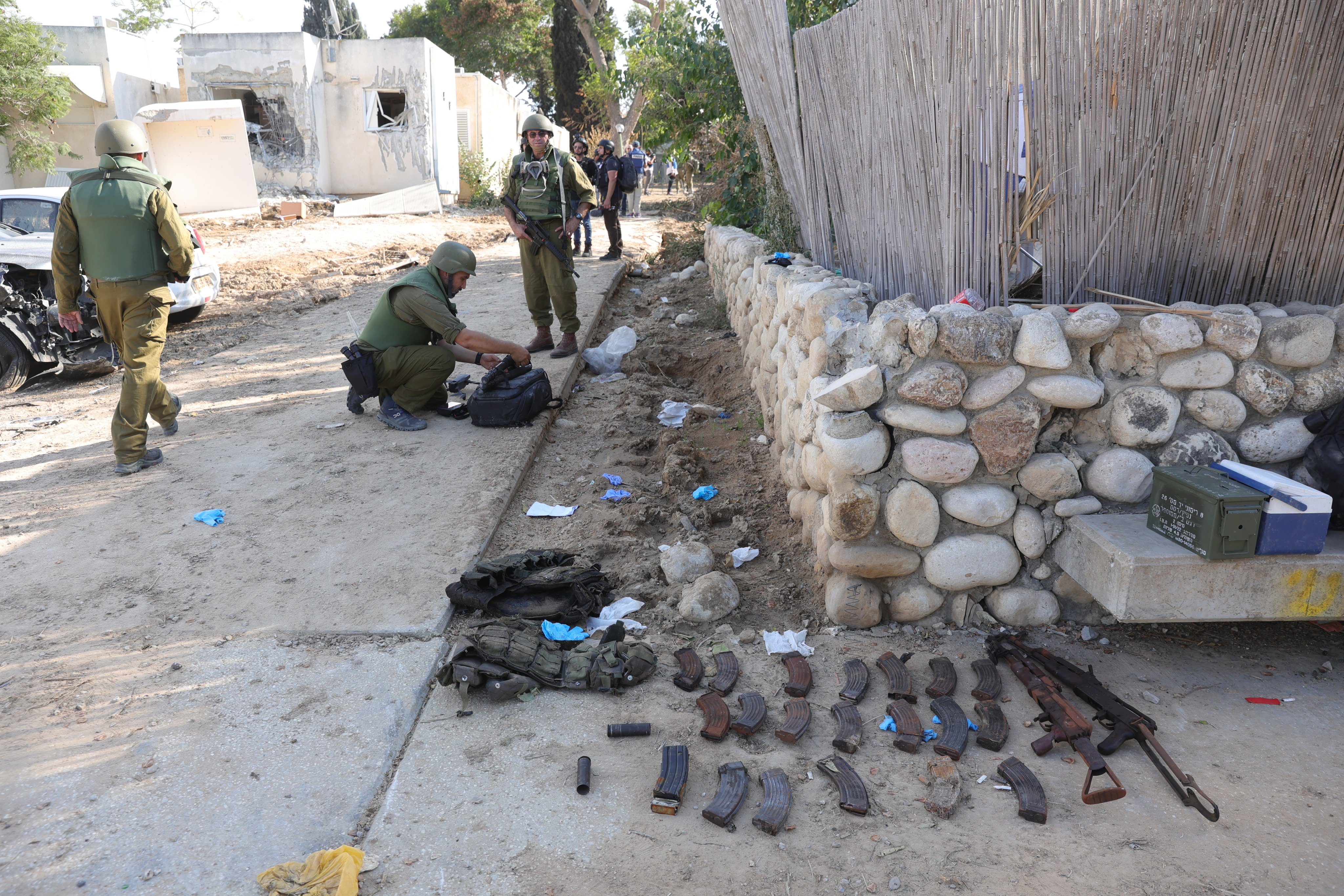 Weapons belonging to Hamas militants lie on the ground at the Kfar Aza Kibbutz, Israel, which was attacked by Hamas on October 7. Photo: EPA-EFE