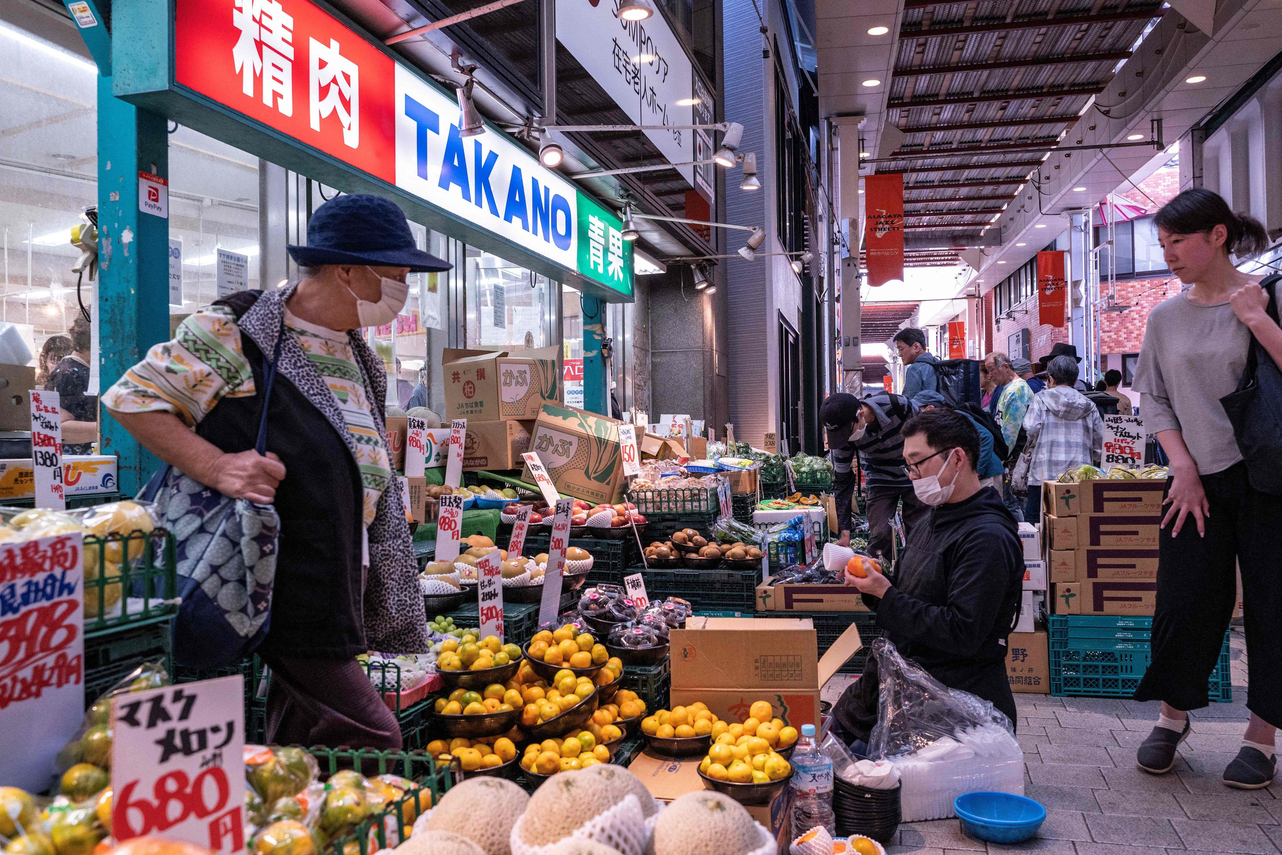 Fruit and vegetables for sale at the entrance to a supermarket in Tokyo on October 7. Household consumption in Japan fell in September for a seventh month in a row with wages remaining lacklustre, showing that Japan’s status as a safe haven amid growing geopolitical uncertainty is not bulletproof. Photo: AFP