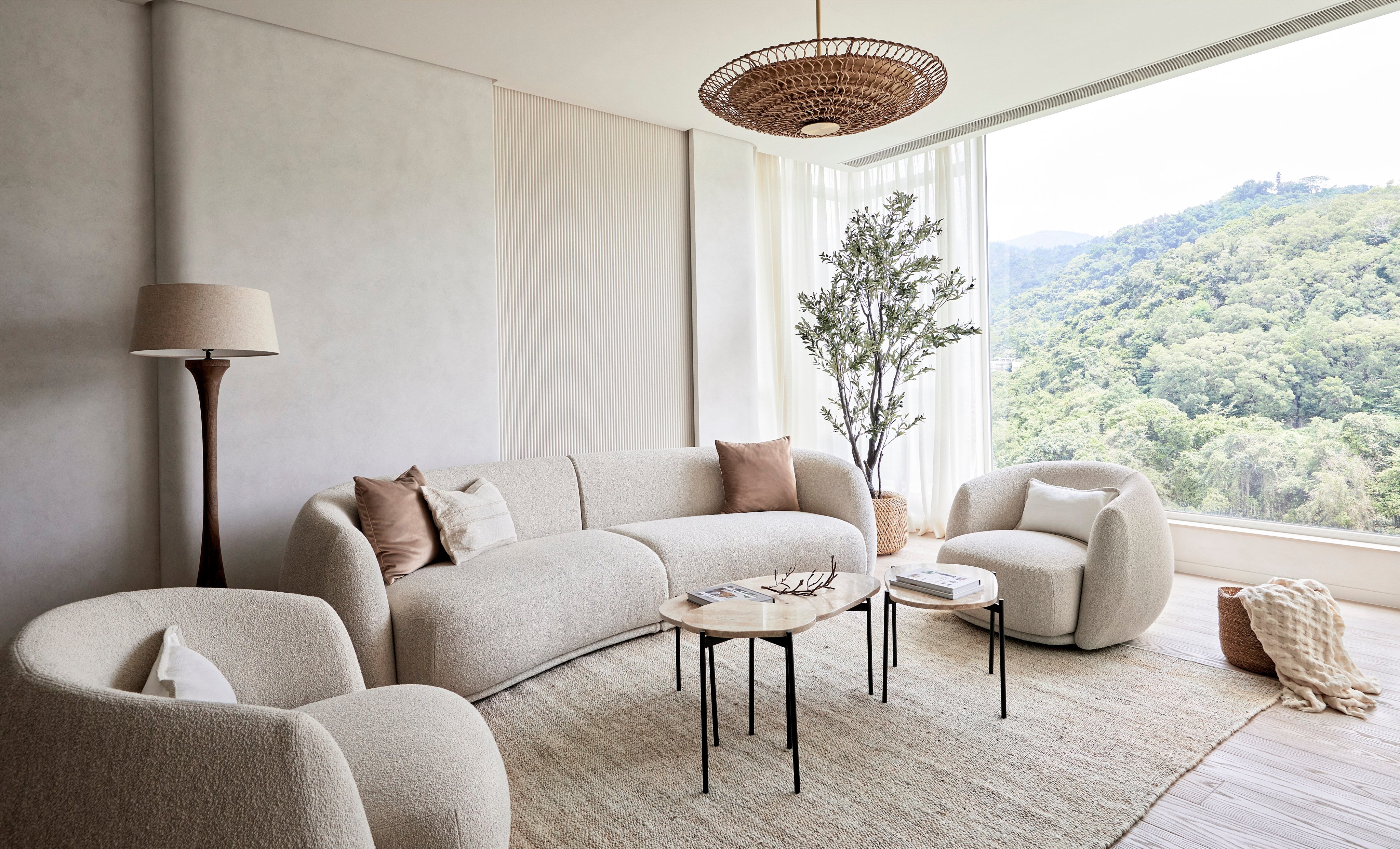 The living room of a home in Sha Tin, Hong Kong, designed by Liquid Interiors. The flat has been renovated for the second time in a decade, transitioning from a child-friendly home to a grown-up space. Photo: Simon J Nicol