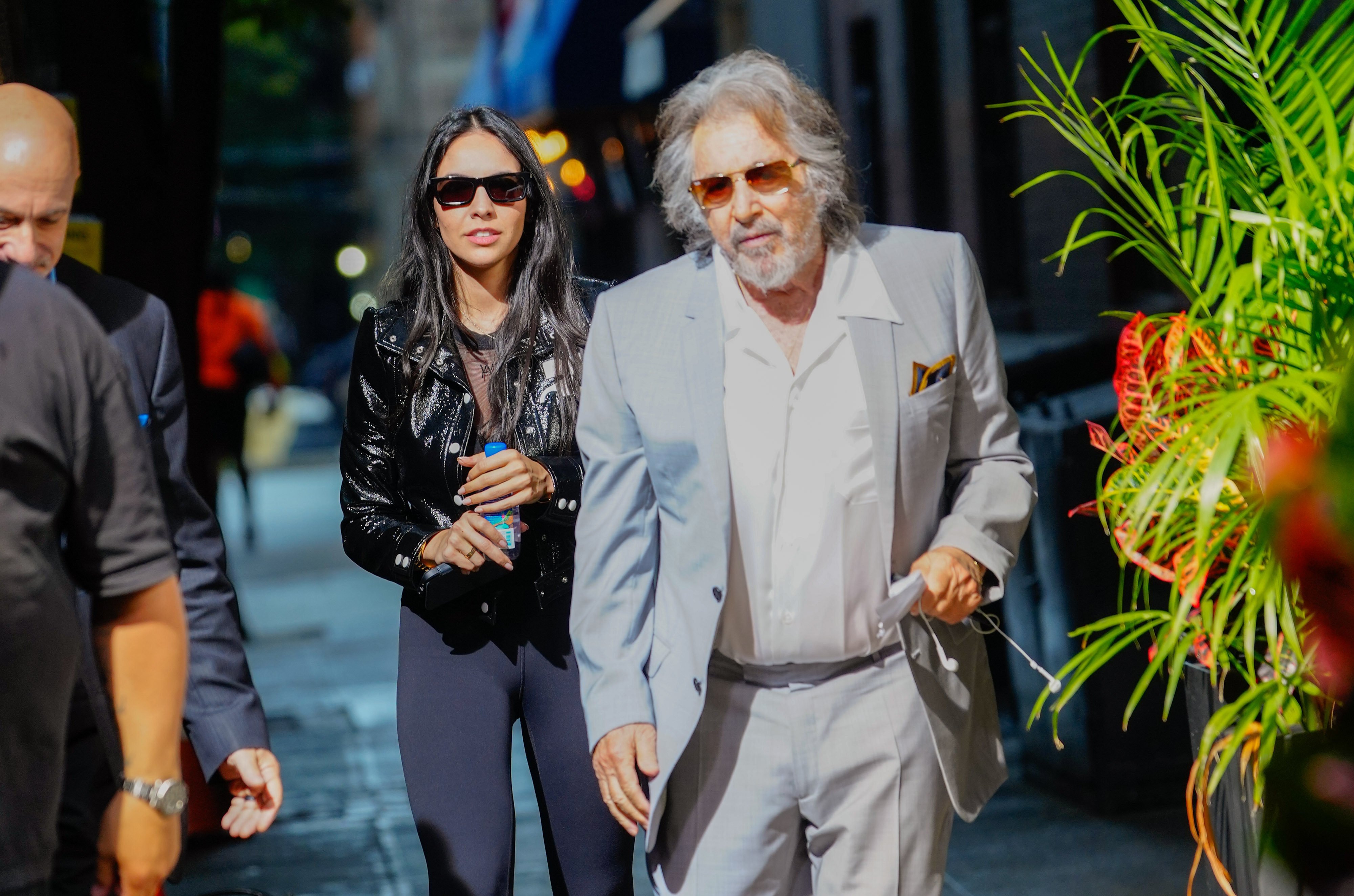 Noor Alfallah and Al Pacino arrive for a music video shoot with Bad Bunny on August 24, in New York City. Photo: GC Images