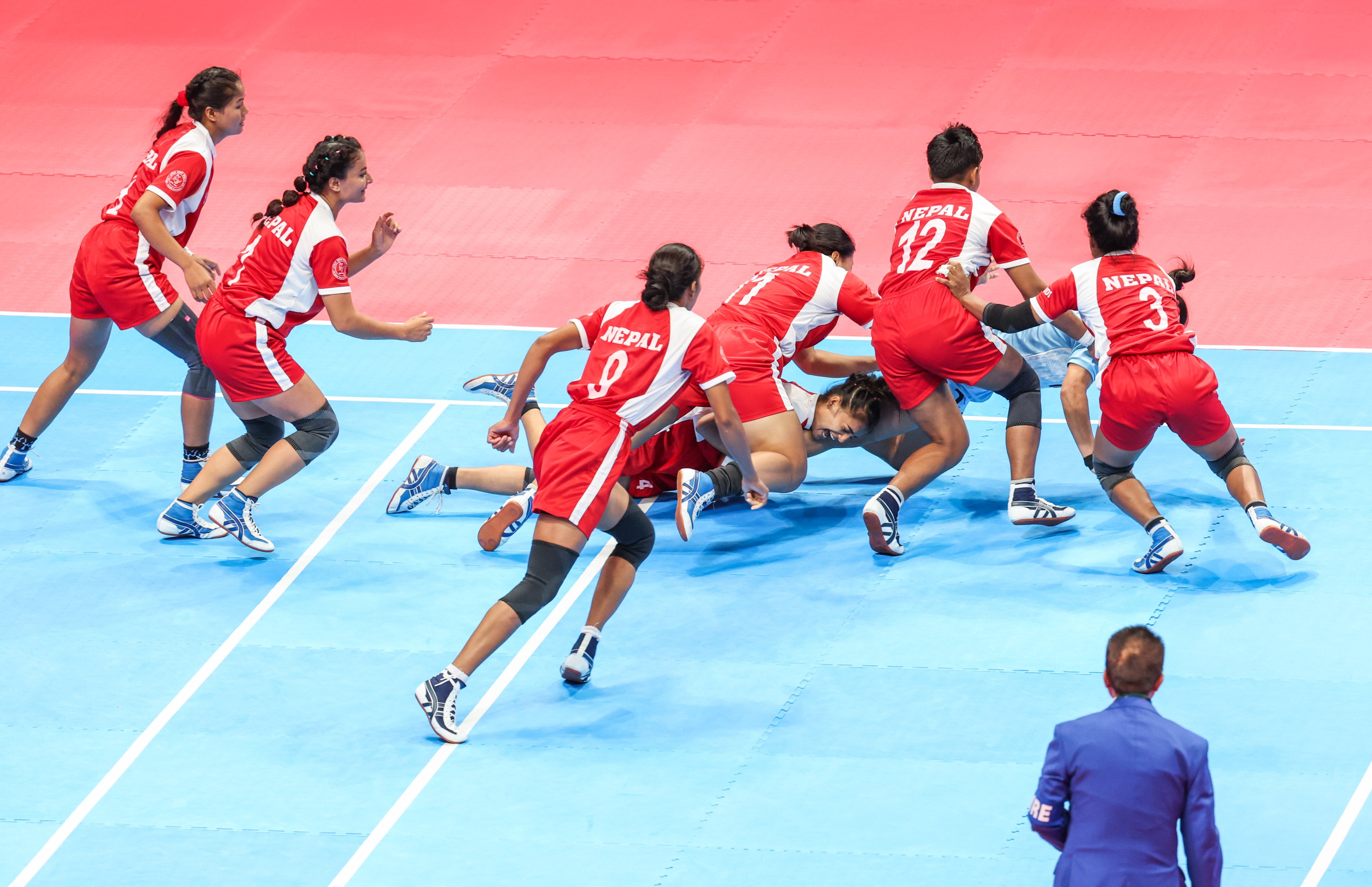 Nepal’s kabaddi players compete against India during the women’s team semi-final at the 19th Asian Games in Hangzhou. Photo: Xinhua