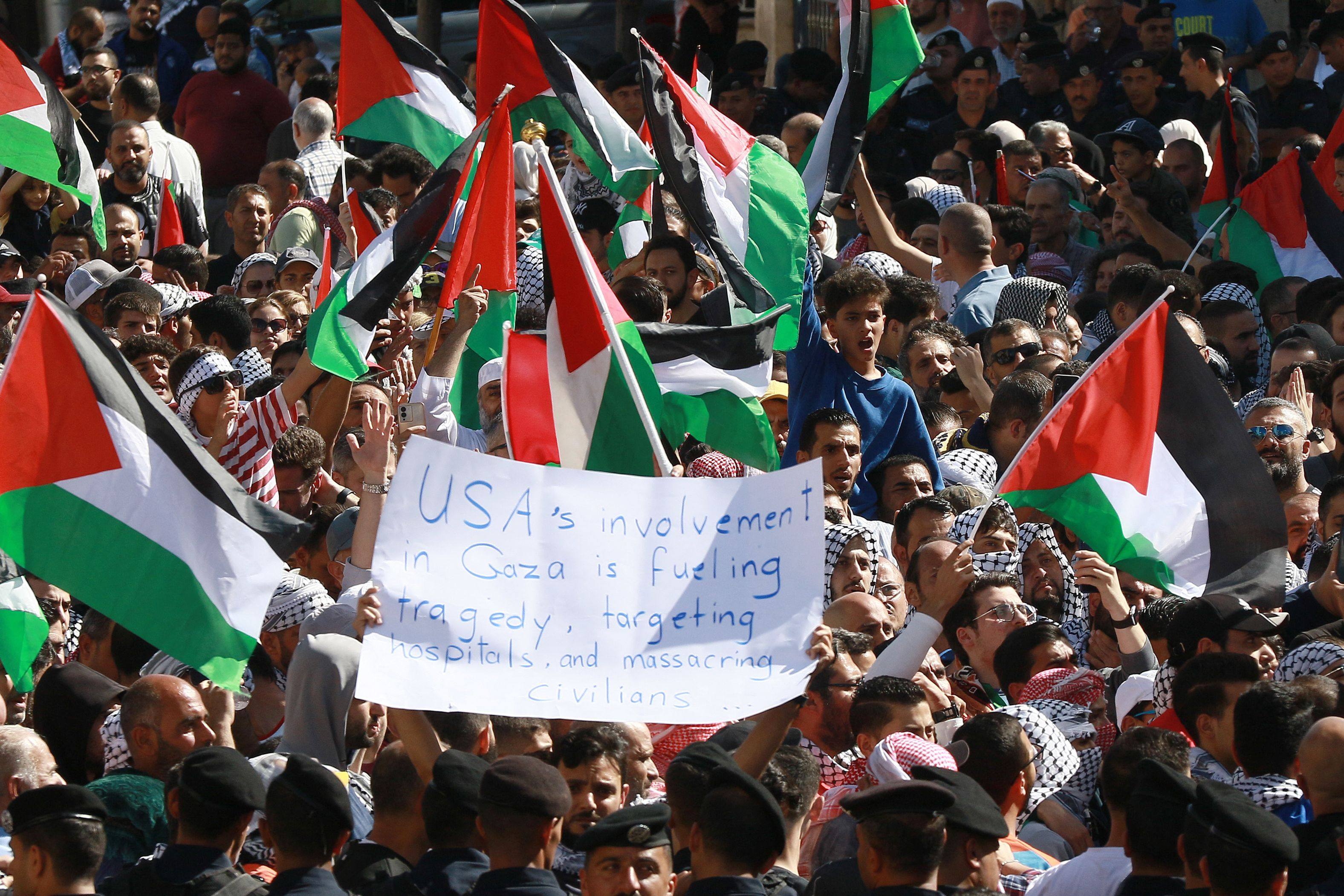 Demonstrators chant slogans near the Israeli embassy in Amman, Jordan, on Friday to show solidarity with the Palestinians of the Gaza Strip. Photo: AFP
