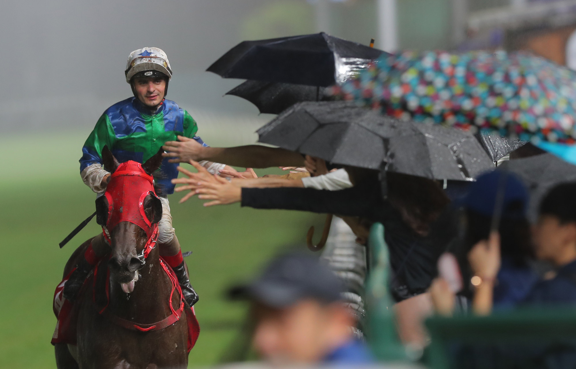 Andrea Atzeni enjoys his victory aboard Copartner Ambition at Happy Valley on Wednesday night.