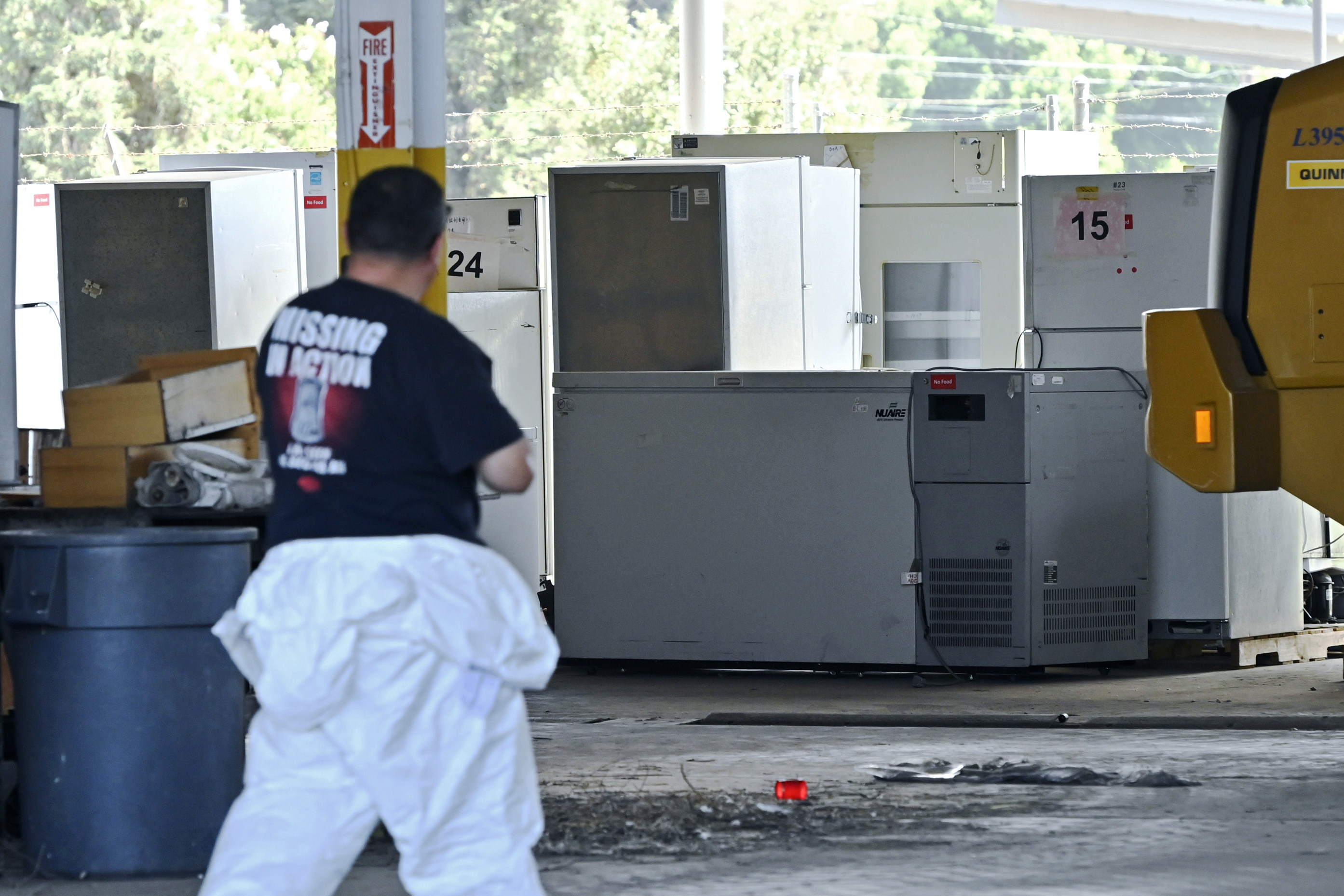 Refrigeration units are seen being collected outside a warehouse that housed a now-shuttered medical lab in Reedley, California, in August. Photo: The Fresno Bee via AP