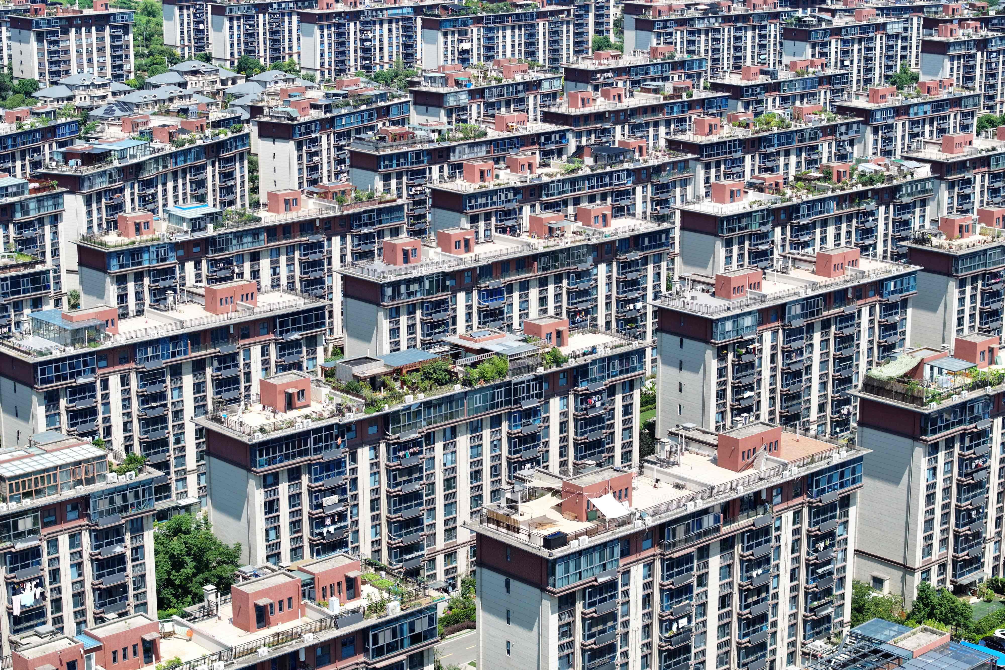China is moving to curb debt risks across the country as a property crisis persists. Photo: AFP