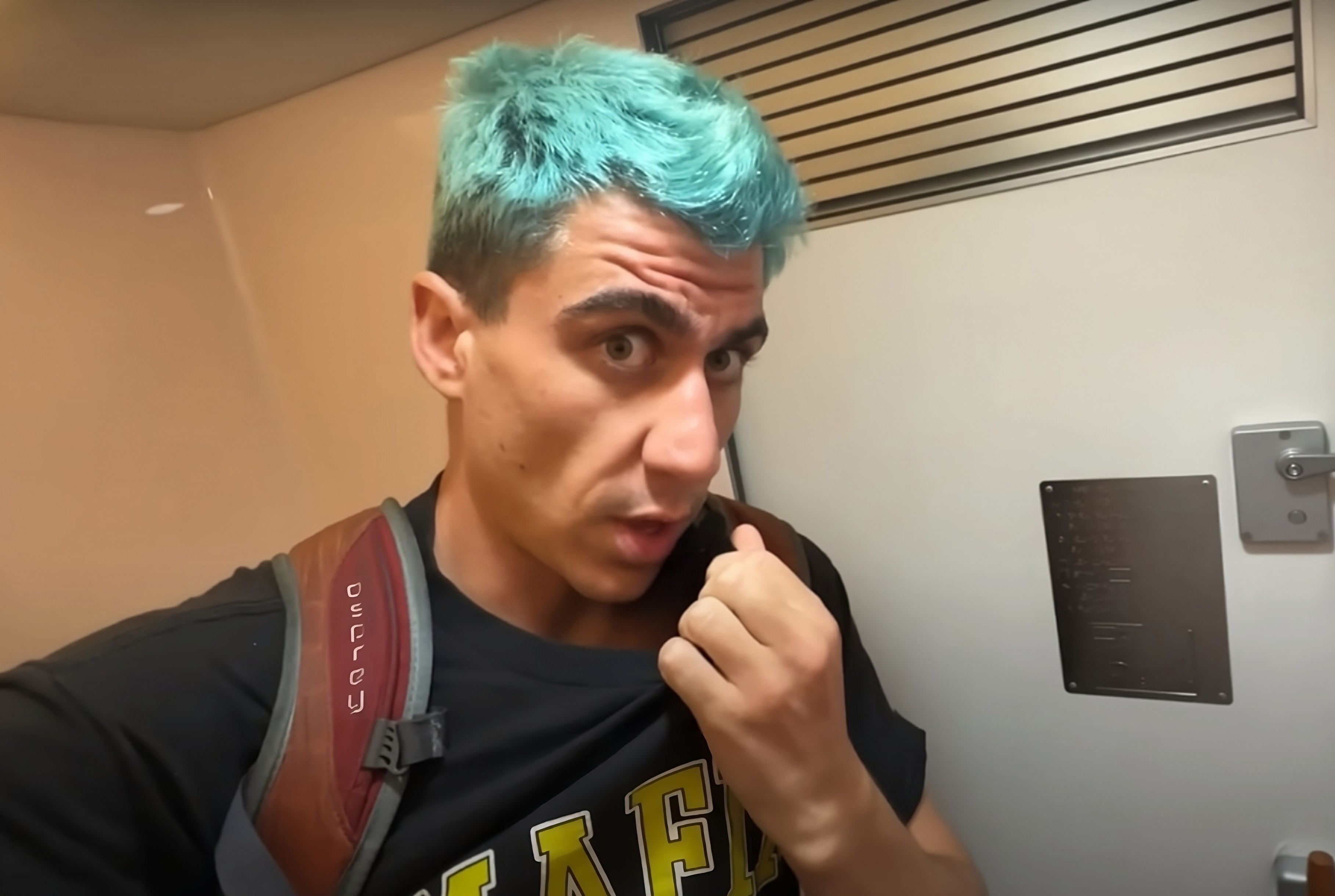 Cypriot YouTuber Fifi “Fidias” Panayiotou films himself hiding in the toilet of a bullet train in Japan to avoid paying the fare. Photo: YouTube/@FidiasPanayiotou