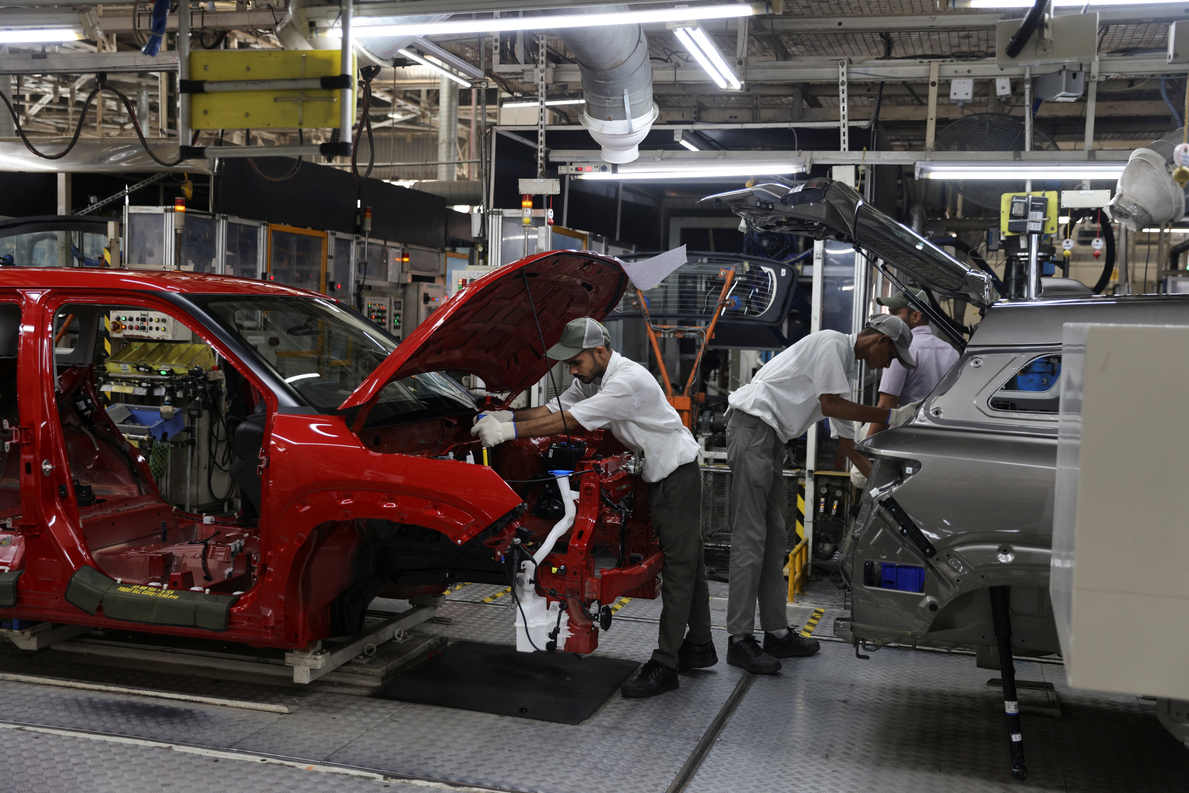 Employees work on an assembly line at the Maruti Suzuki plant in Manesar, in the northern state of Haryana, India, on September 26. India has emerged as a potential alternative for investors amid rising US-China tensions and economic uncertainty. Photo: Reuters