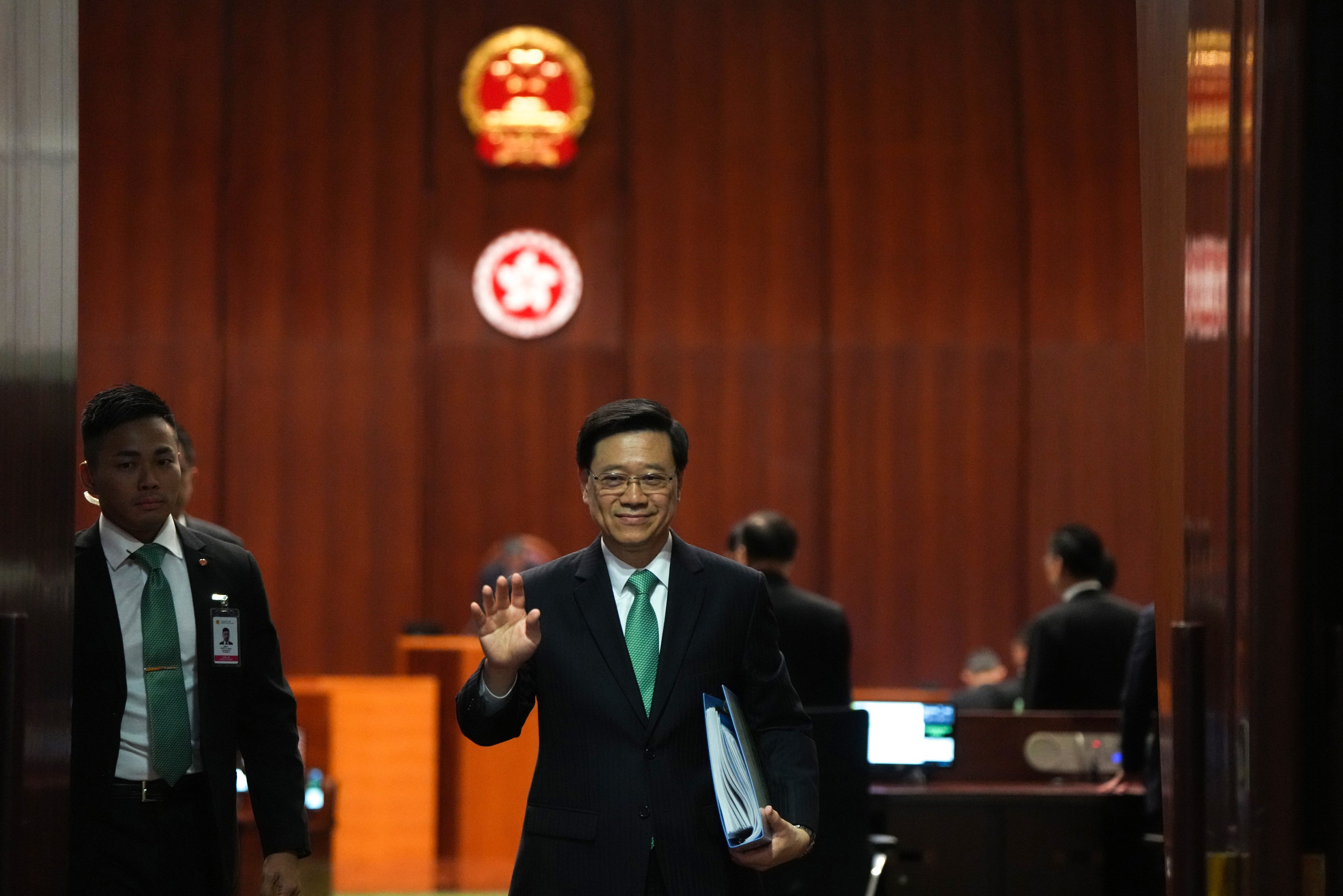 Chief Executive John Lee leaves the Legco chamber after delivering his policy address. Photo: Sam Tsang
