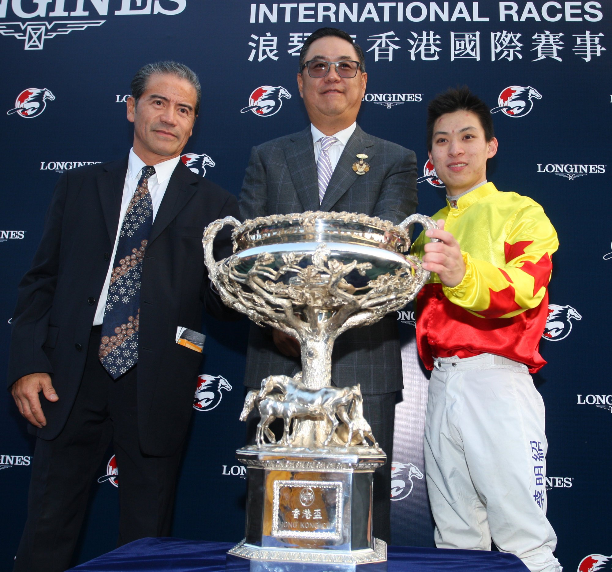 Tony Cruz, Howard Liang and Matthew Chadwick celebrate California Memory’s second Hong Kong Cup win in 2012.