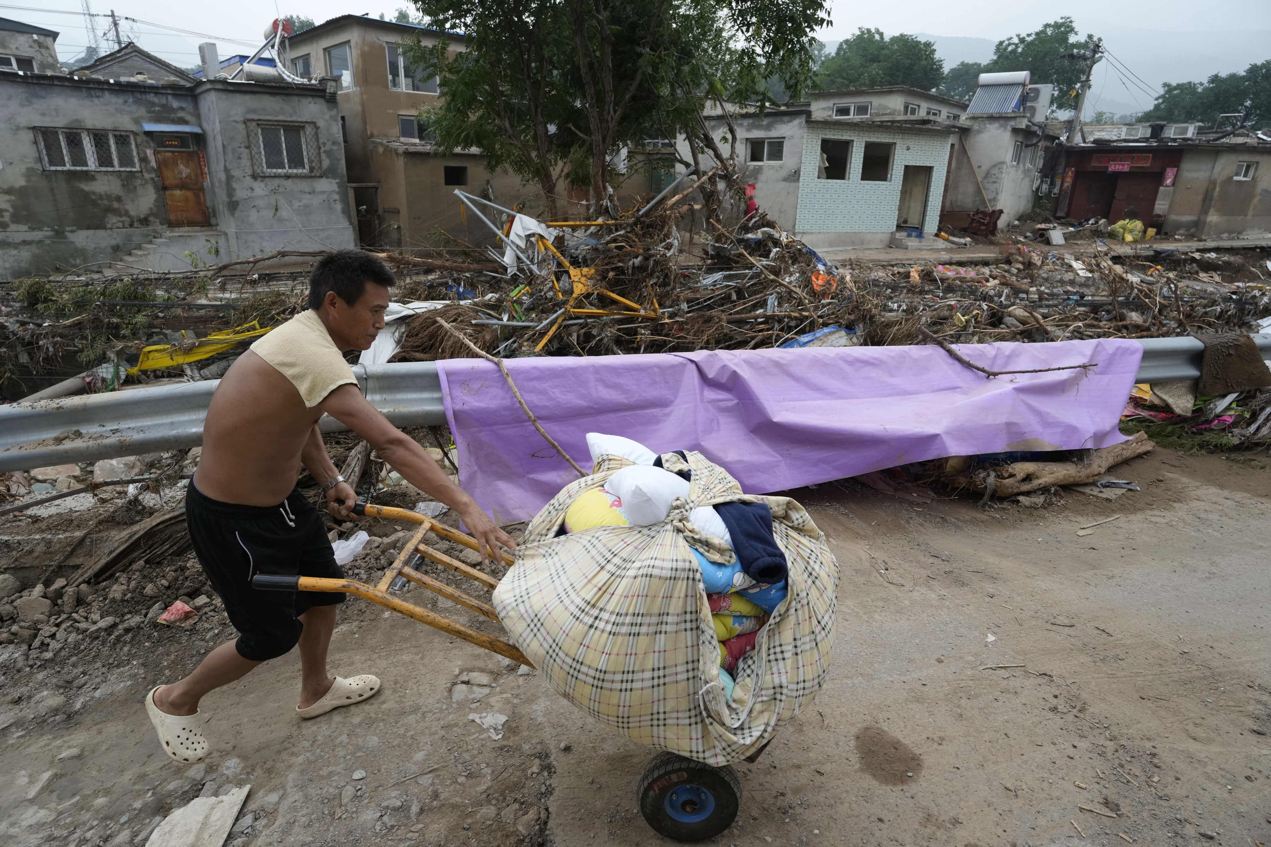 Finance vice-minister Zhu Zhongming said the 1 trillion sovereign debt issuance is aimed at supporting reconstruction and improving disaster prevention and relief capabilities. Photo: AP