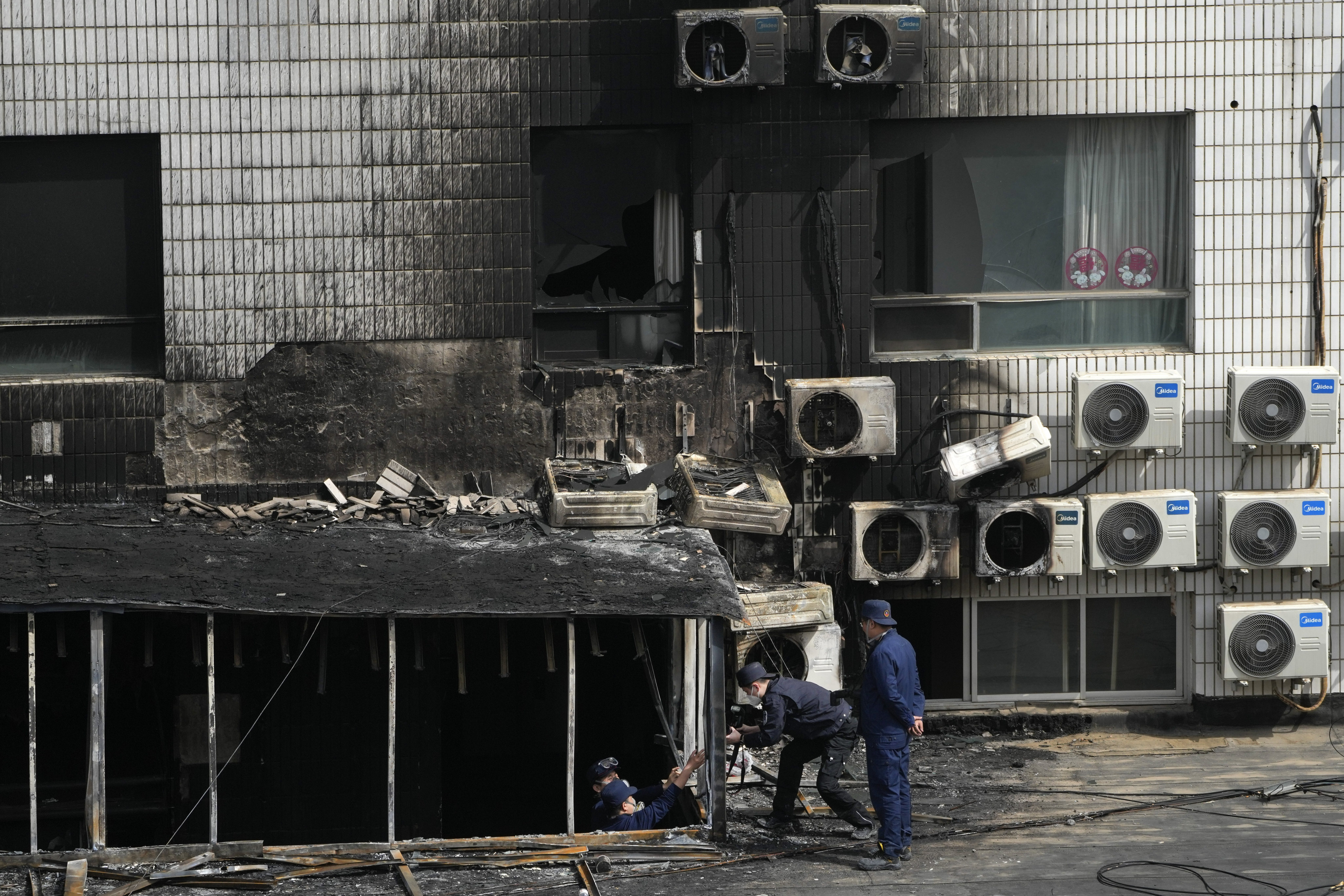 Investigators said irregularities in renovation work at the Changfeng Hospital had led to the fire. Photo: AP