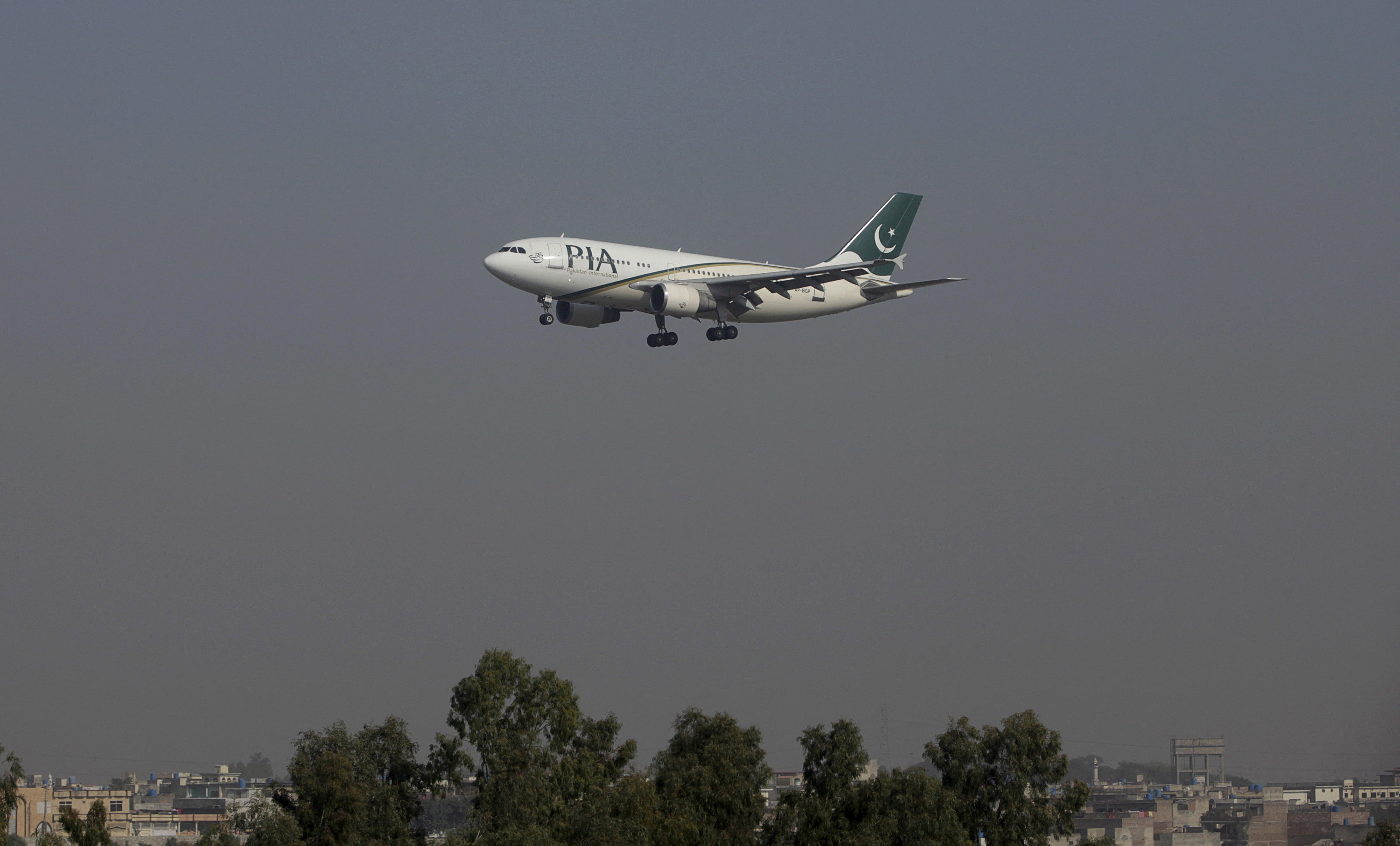  A Pakistan International Airlines passenger plane arriving at Benazir International airport in Islamabad. Photo: Reuters