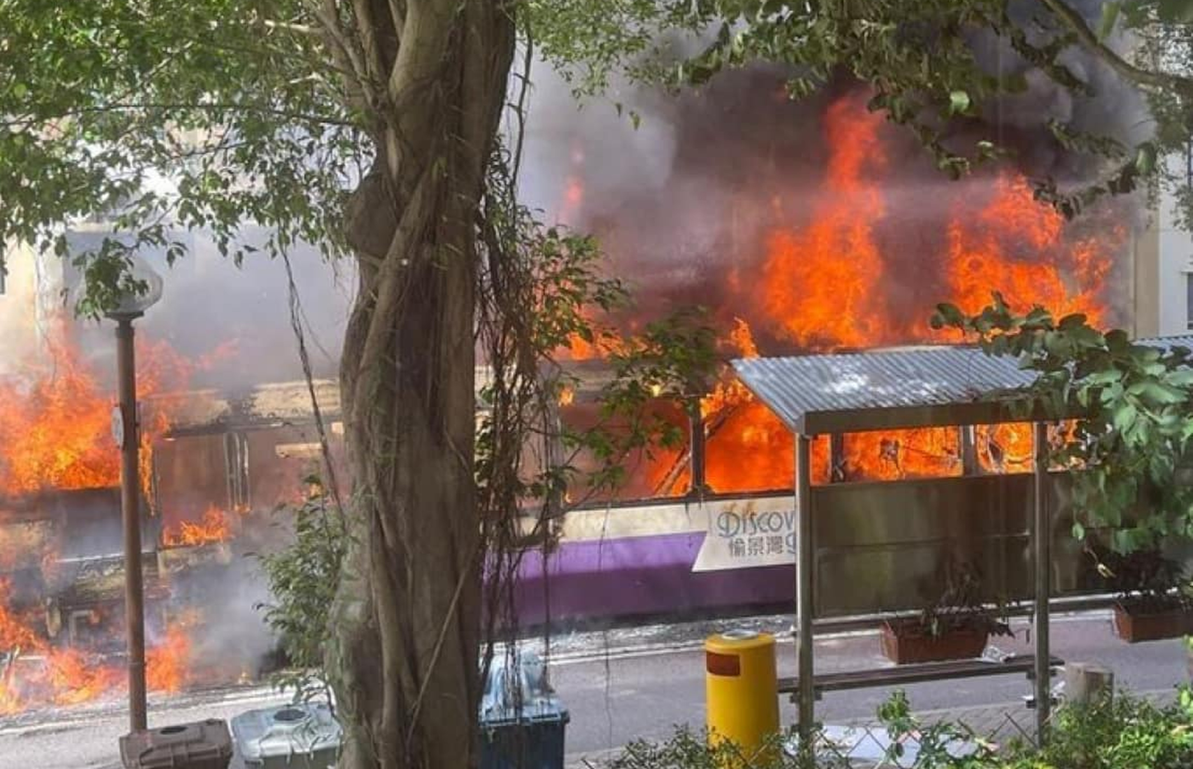 A bus burst into flames outside Peninsula Village in Discovery Bay on Friday. Photo: Brandon Wong