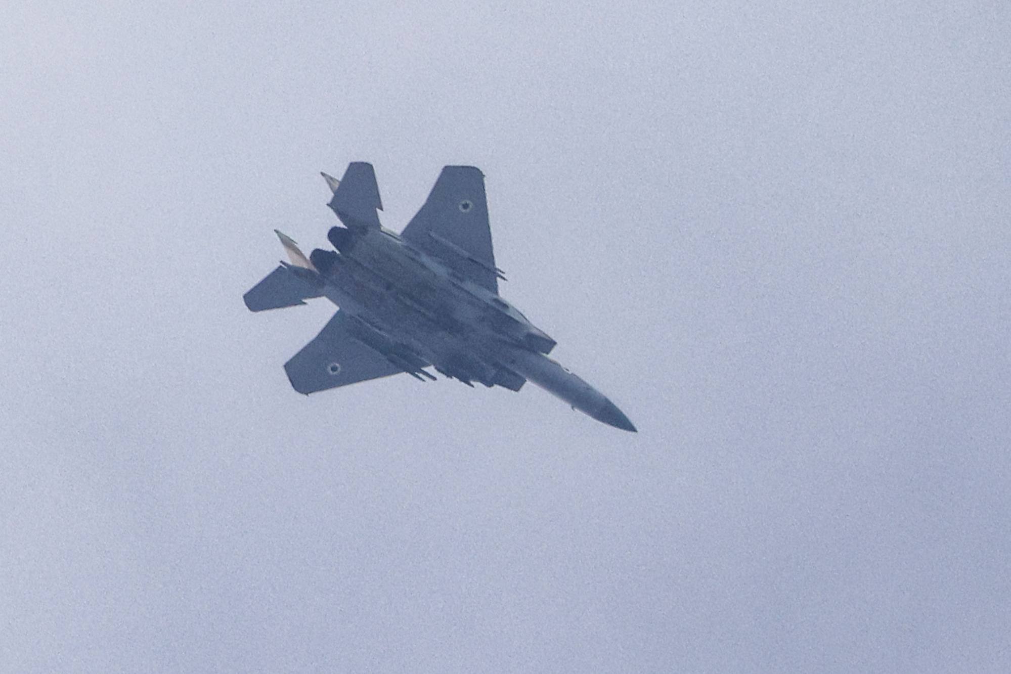 An Israeli air force F-15 fighter aircraft flies along the border with the Gaza Strip near Sderot in southern Israel. Photo: AFP