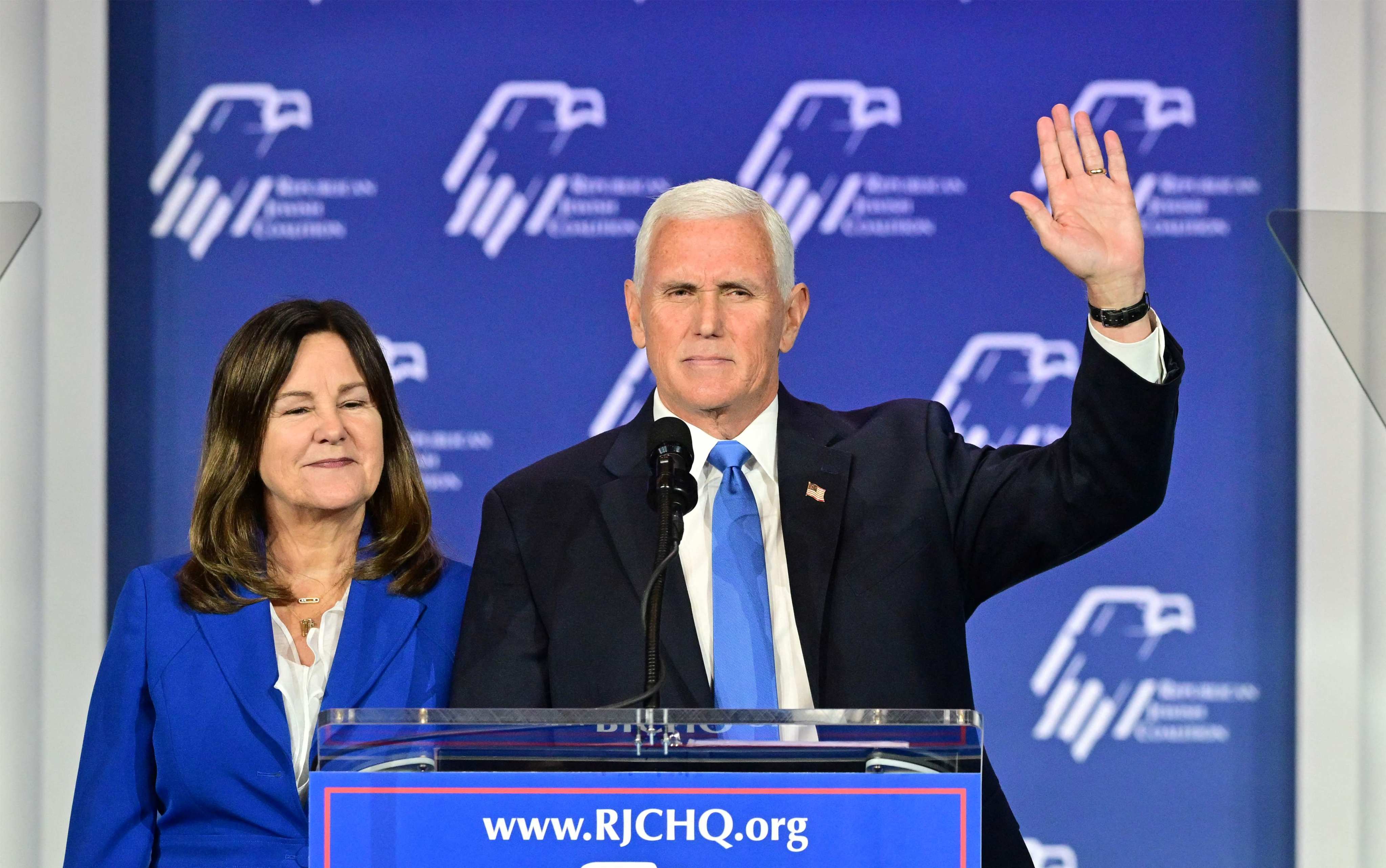 Former US vice-president Mike Pence, with his wife Karen Pence, acknowledges the crowd at an event in Las Vegas on Saturday after announcing he is dropping out of the 2024 presidential race. Photo: AFP