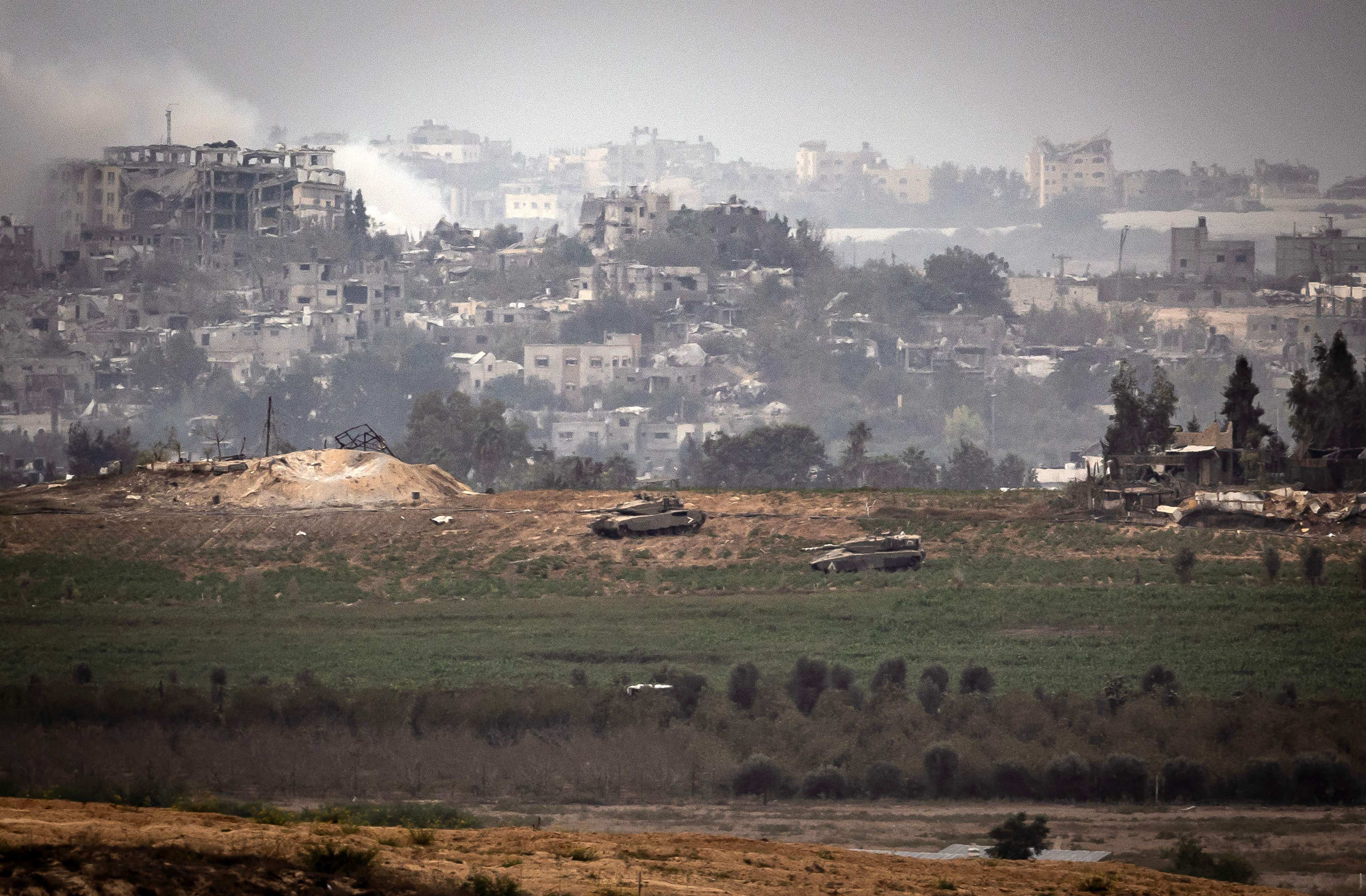 Palestinians break into Gaza UN aid warehouses as toll tops 8,000