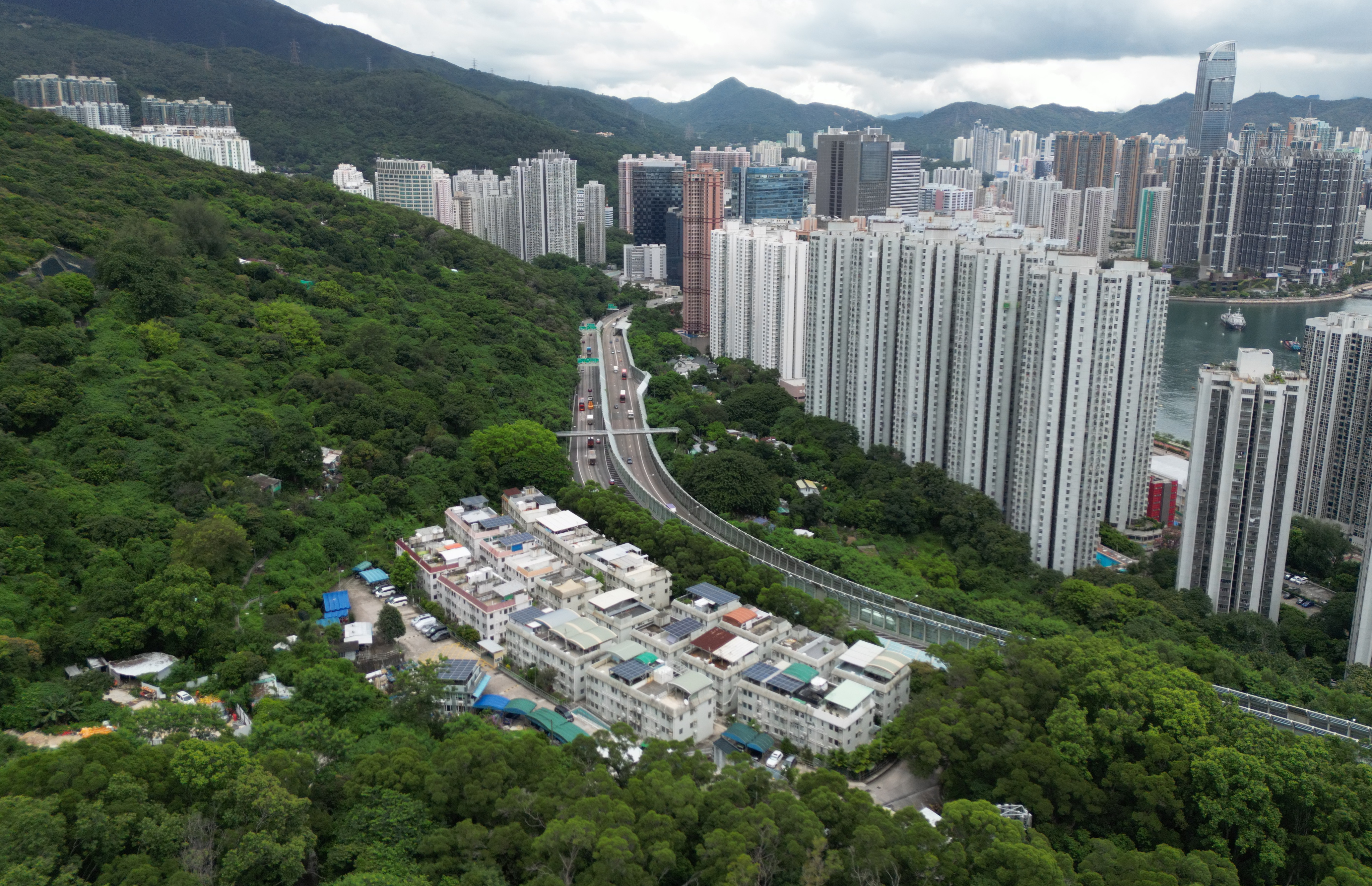 An aerial view of village houses at Yau Kom Tau in Tsuen Wan on August 24. Hong Kong’s property market has endured several difficult years, but prudent regulation and the government’s new-found interest in addressing chronic housing undersupply should avert any large-scale crisis.  Photo: Dickson Lee