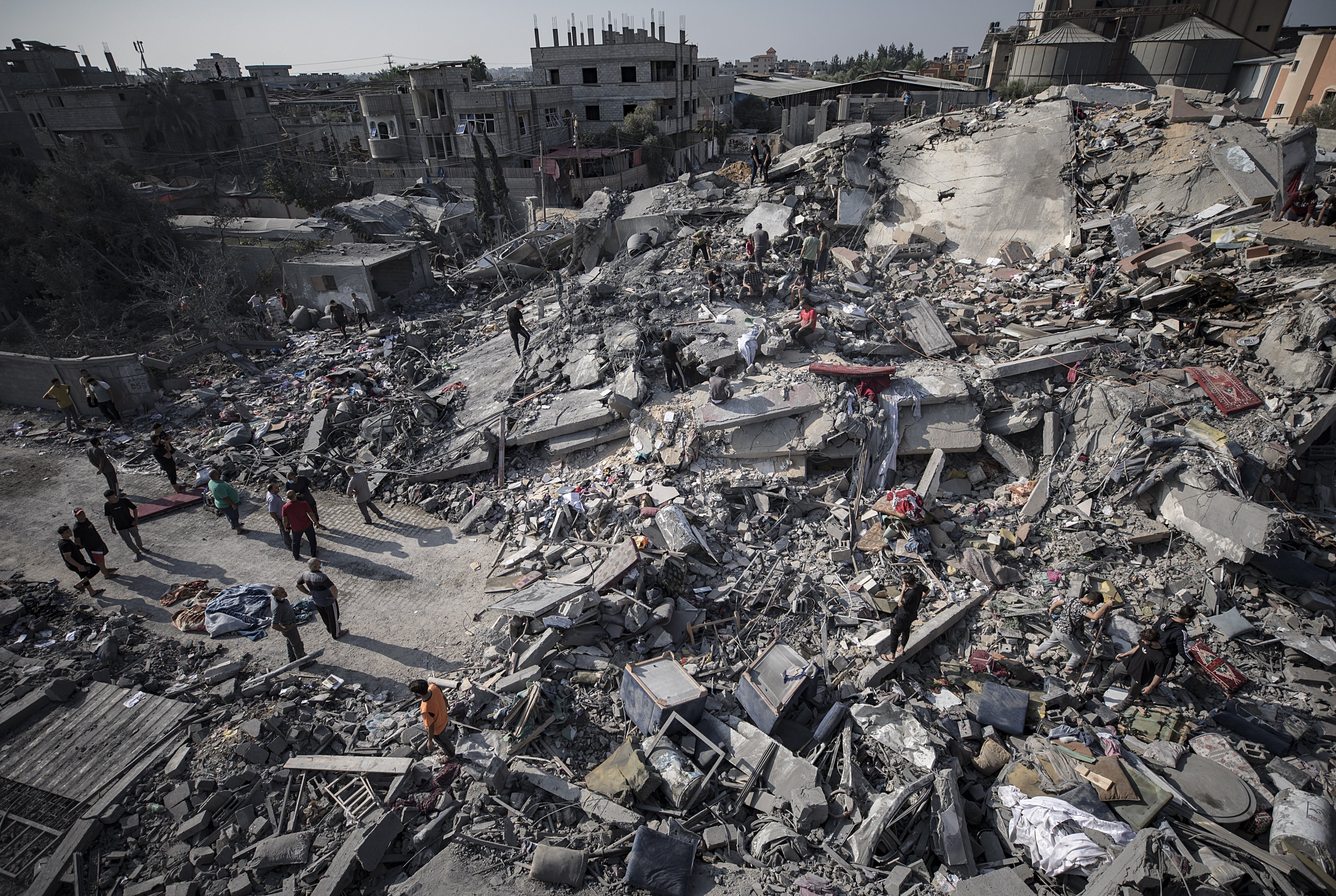 Palestinians search for bodies and survivors following an Israeli airstrike in Gaza on Wednesday. Photo: EPA-EFE