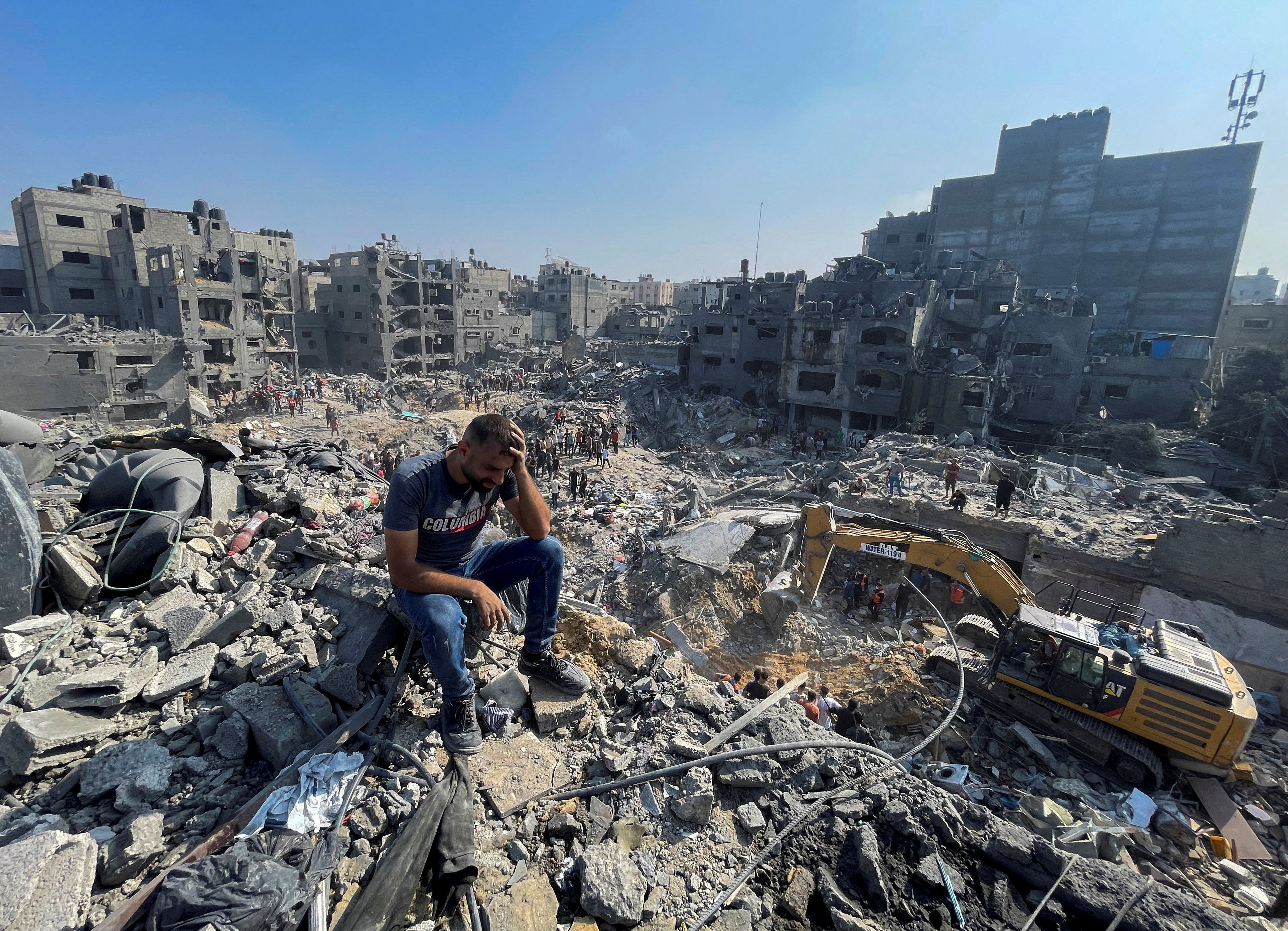 A man reacts as Palestinians search for casualties on Wednesday after Israeli strikes on the Jabalia refugee camp in the northern Gaza Strip. Photo: Reuters