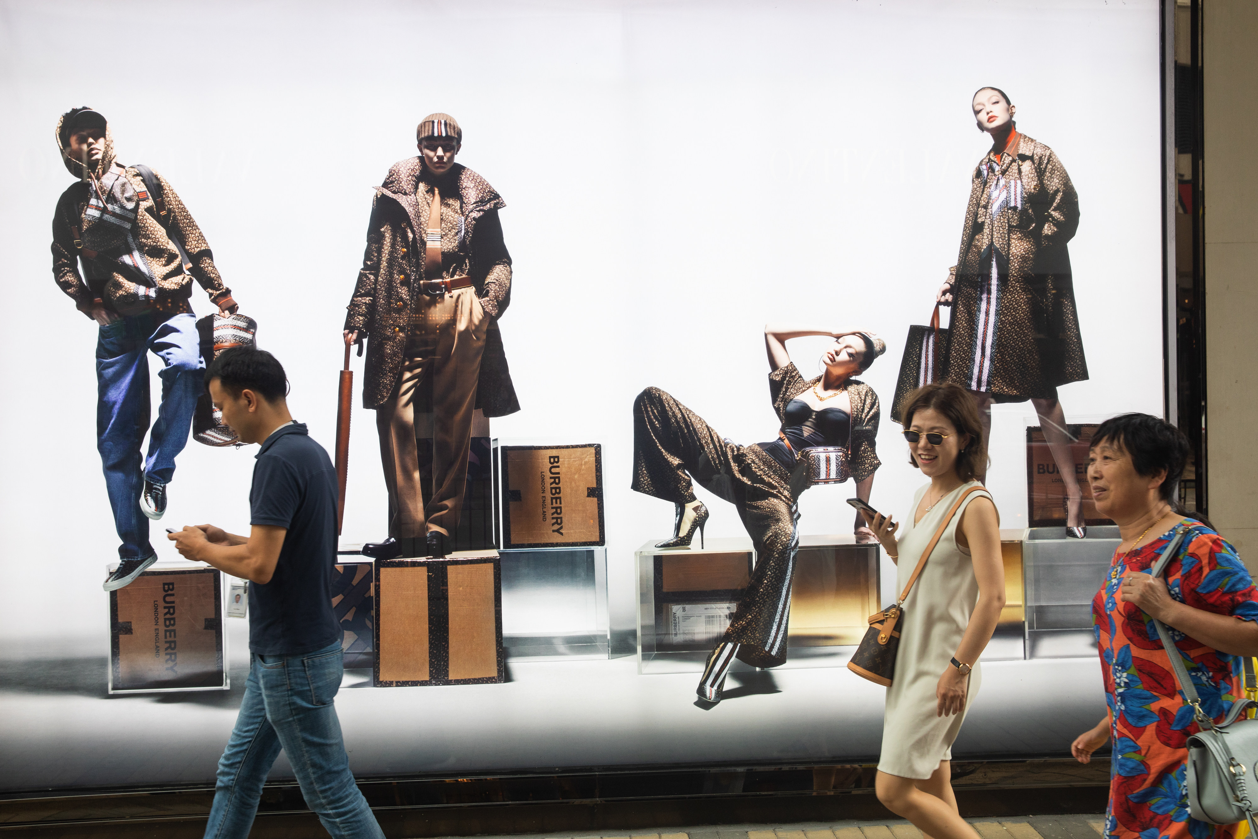 Pedestrians walk past a Burberry store on popular luxury shopping street Canton Road in Tsim Sha Tsui, Hong Kong, in July 2019. Photo: Bloomberg