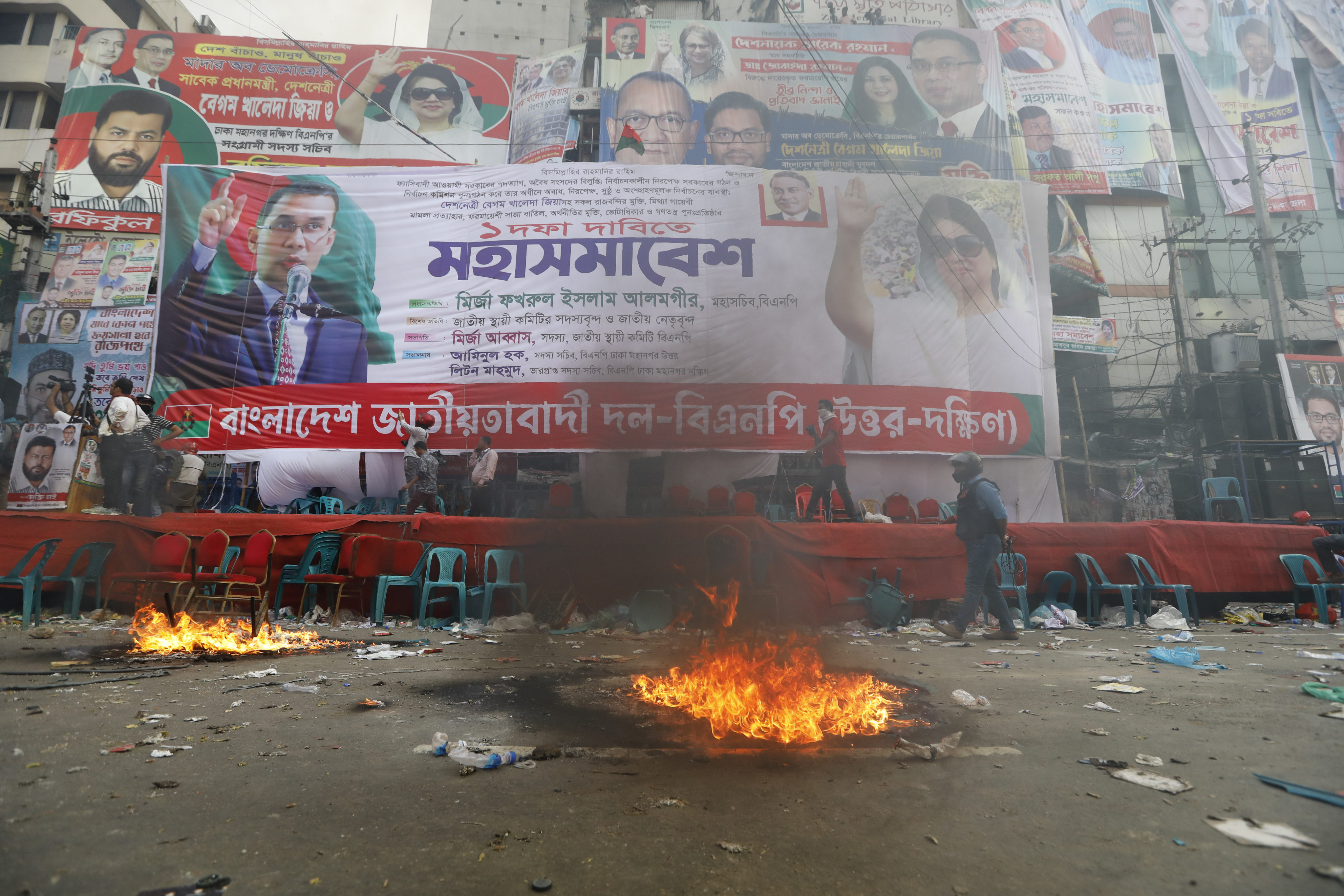 Smoke rises from flames near the stage set for a protest by the Bangladesh Nationalist Party in Dhaka. Photo: AP