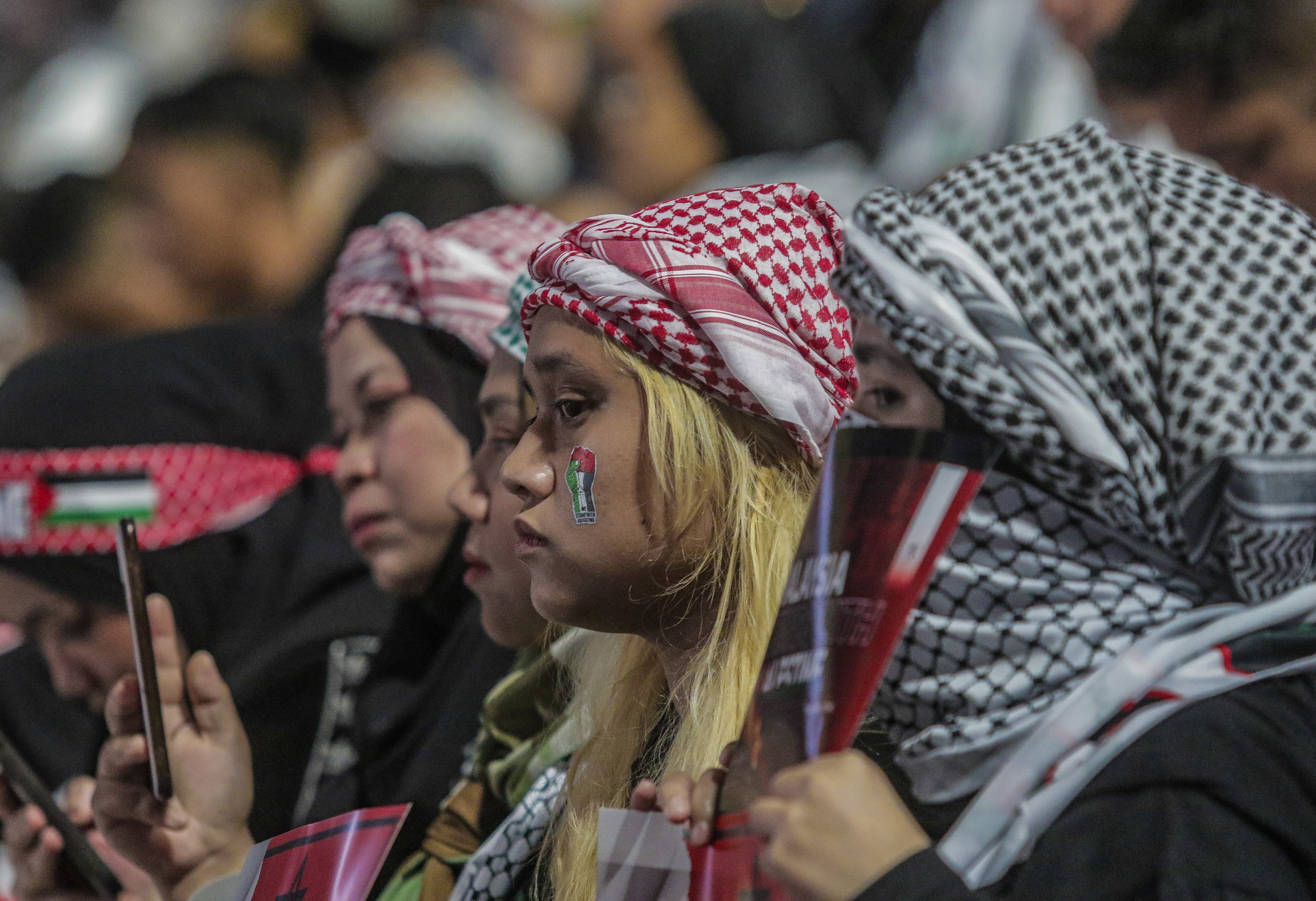 Attendees at the ‘Malaysia Stands with Palestine’ rally in Kuala Lumpur on October 24, 2023. Photo: EPA-EFE