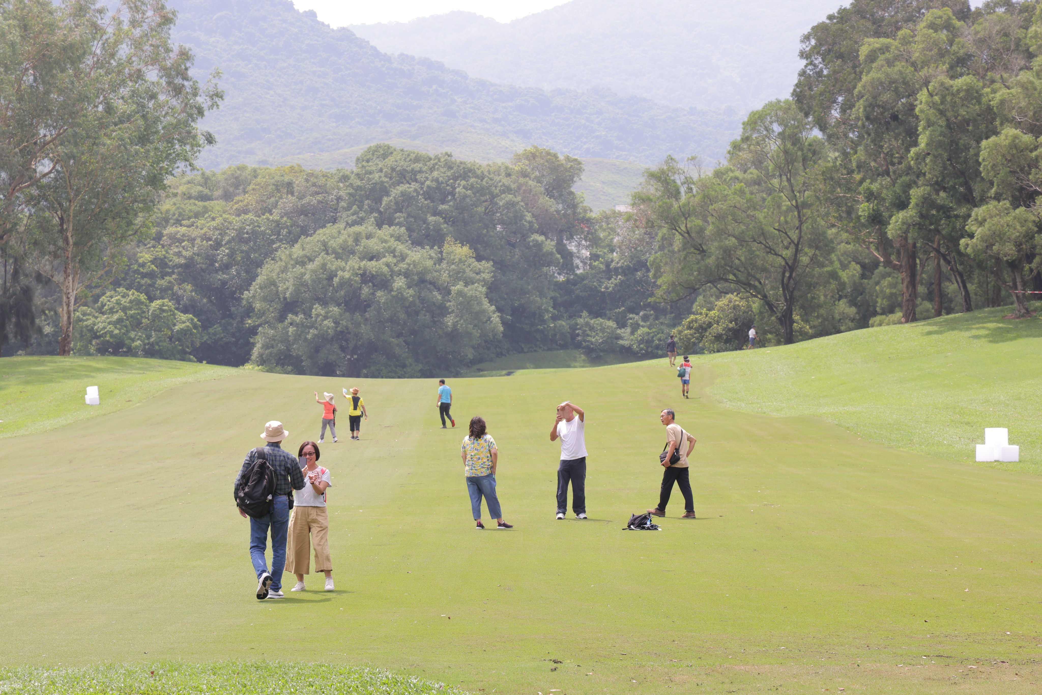 People take photos on a section of Hong Kong’s oldest golf course in Fanling on September 4. Photo: Jelly Tse