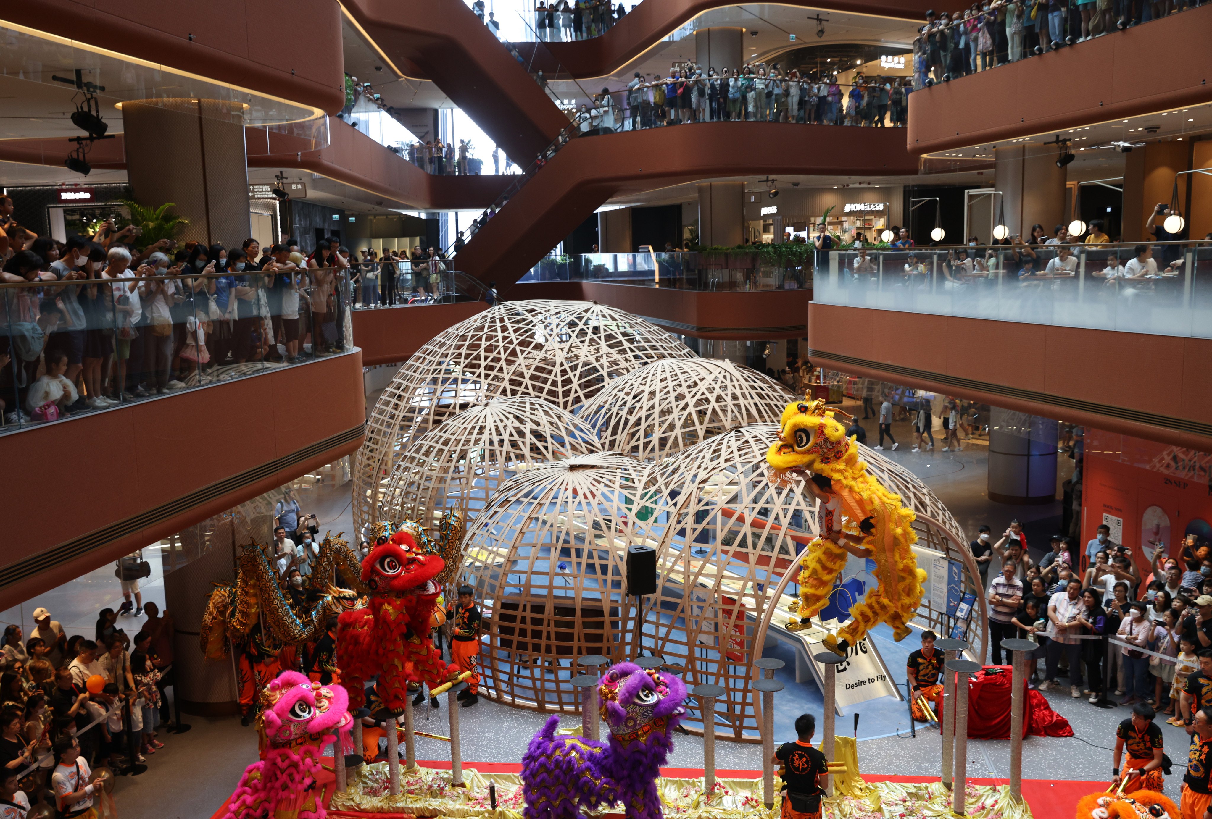 Lion dance performer are seen at the newly opened Airside shopping centre at Kai Tak in Hong Kong on September 30, 2023. Photo: Yik Yeung-man