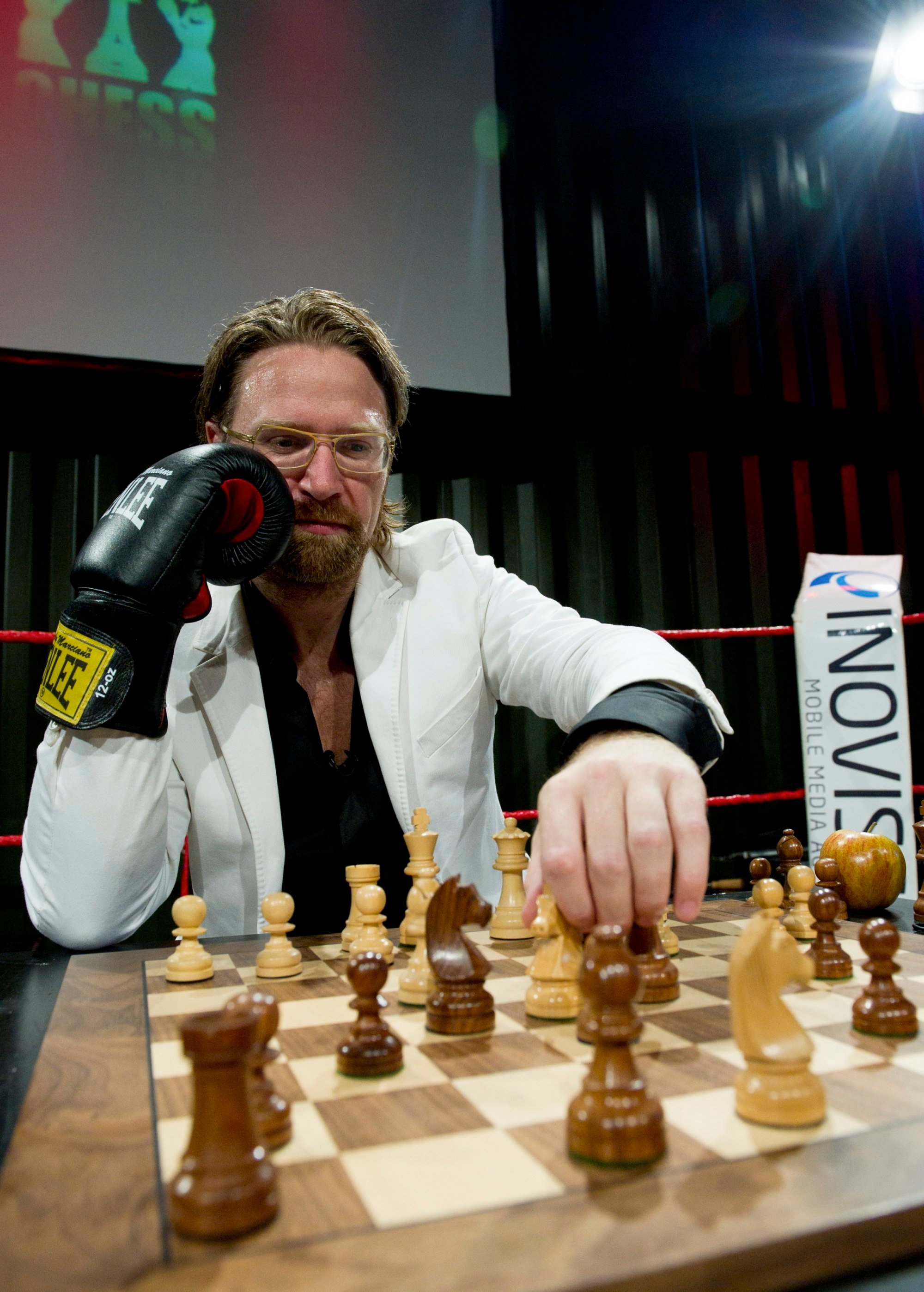 Chessboxing, amateur boxing and chess board game being played