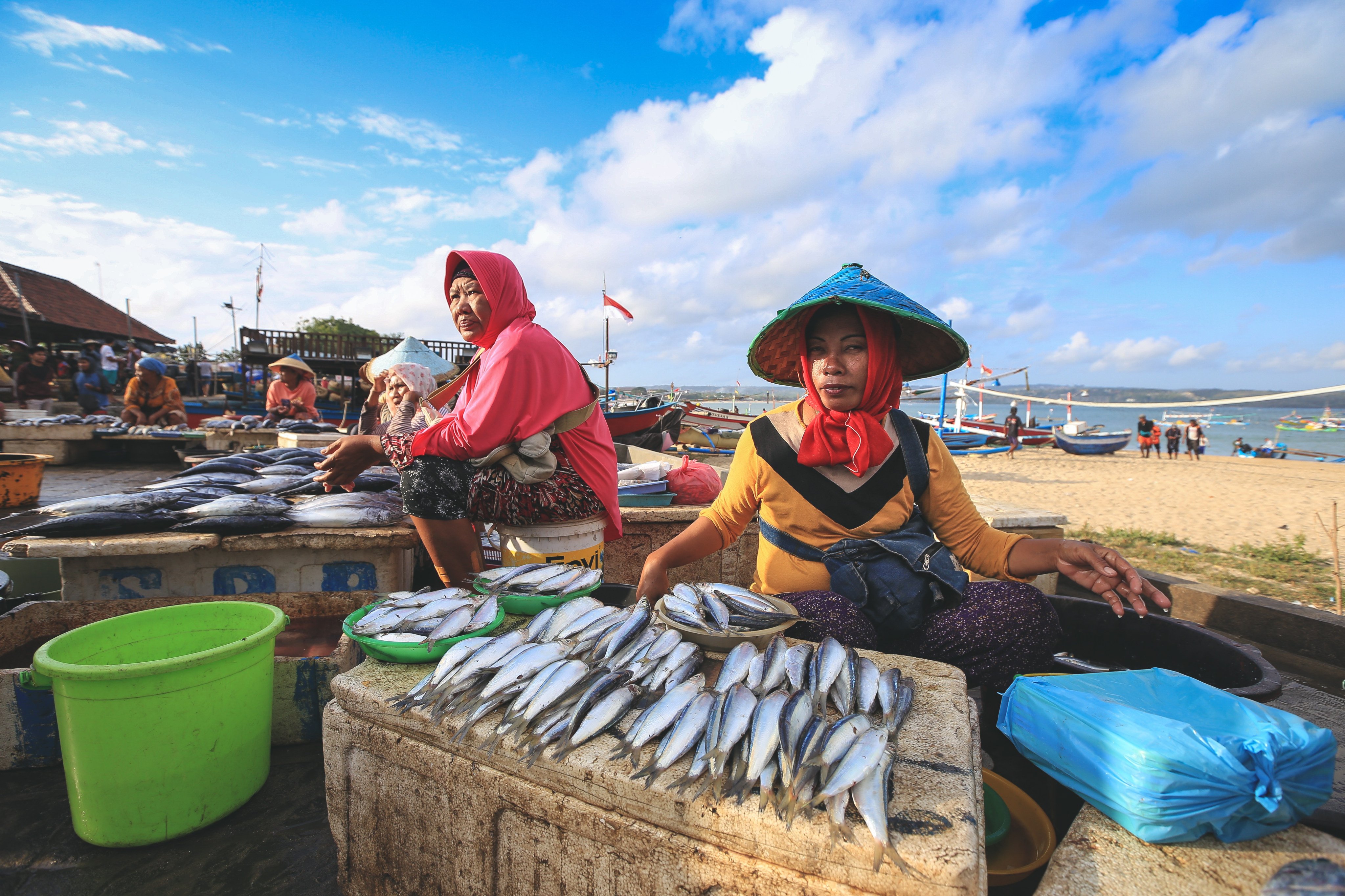 Women sell fish in Bali, Indonesia. Photo: Shutterstock