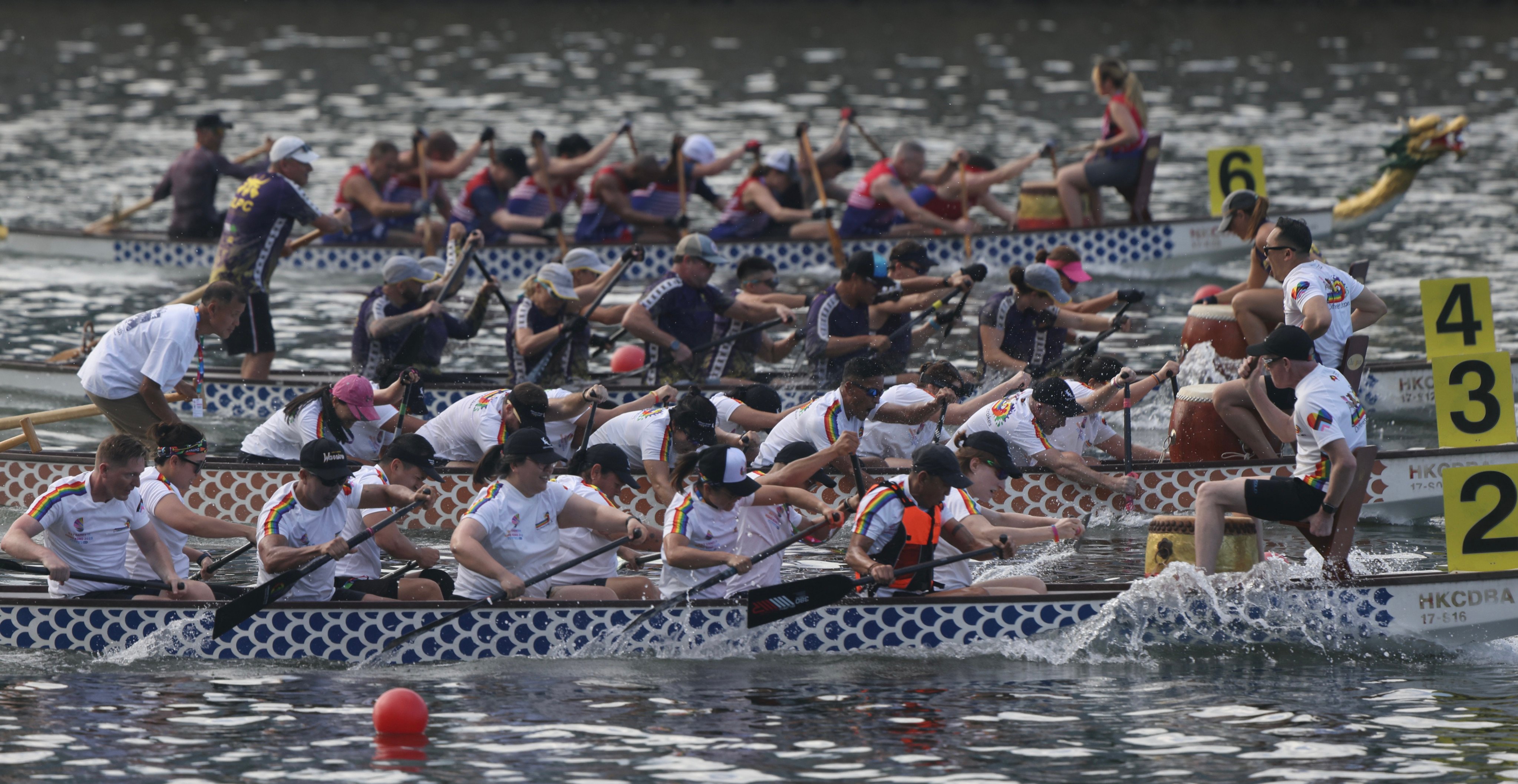 Dragon boat teams  battle it out on the Shing Mun River. Photo: Jonathan Wong
