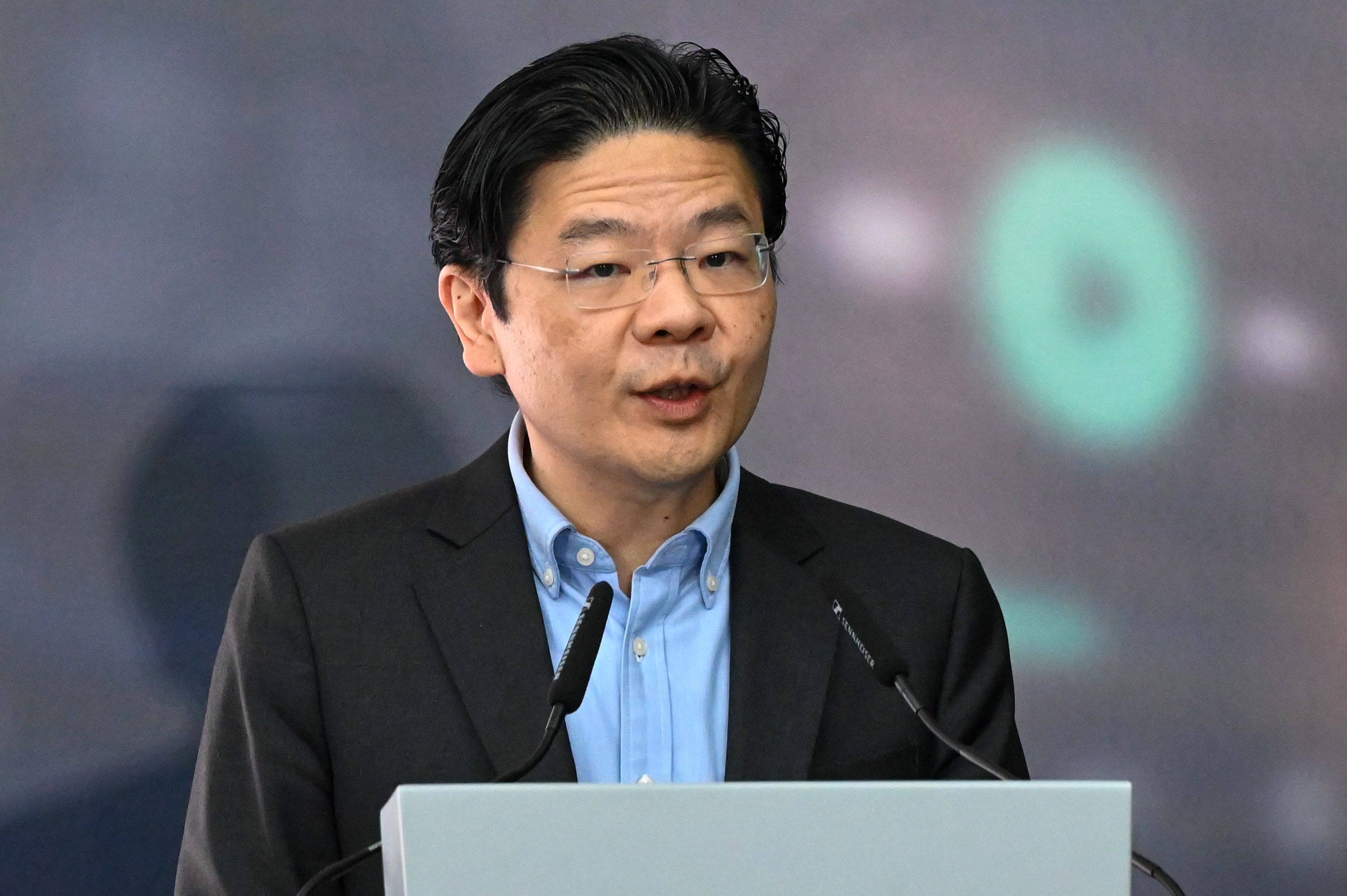 Deputy Prime Minister Lawrence Wong says Singapore will continue to take an approach aligned with international laws. Photo: AFP 