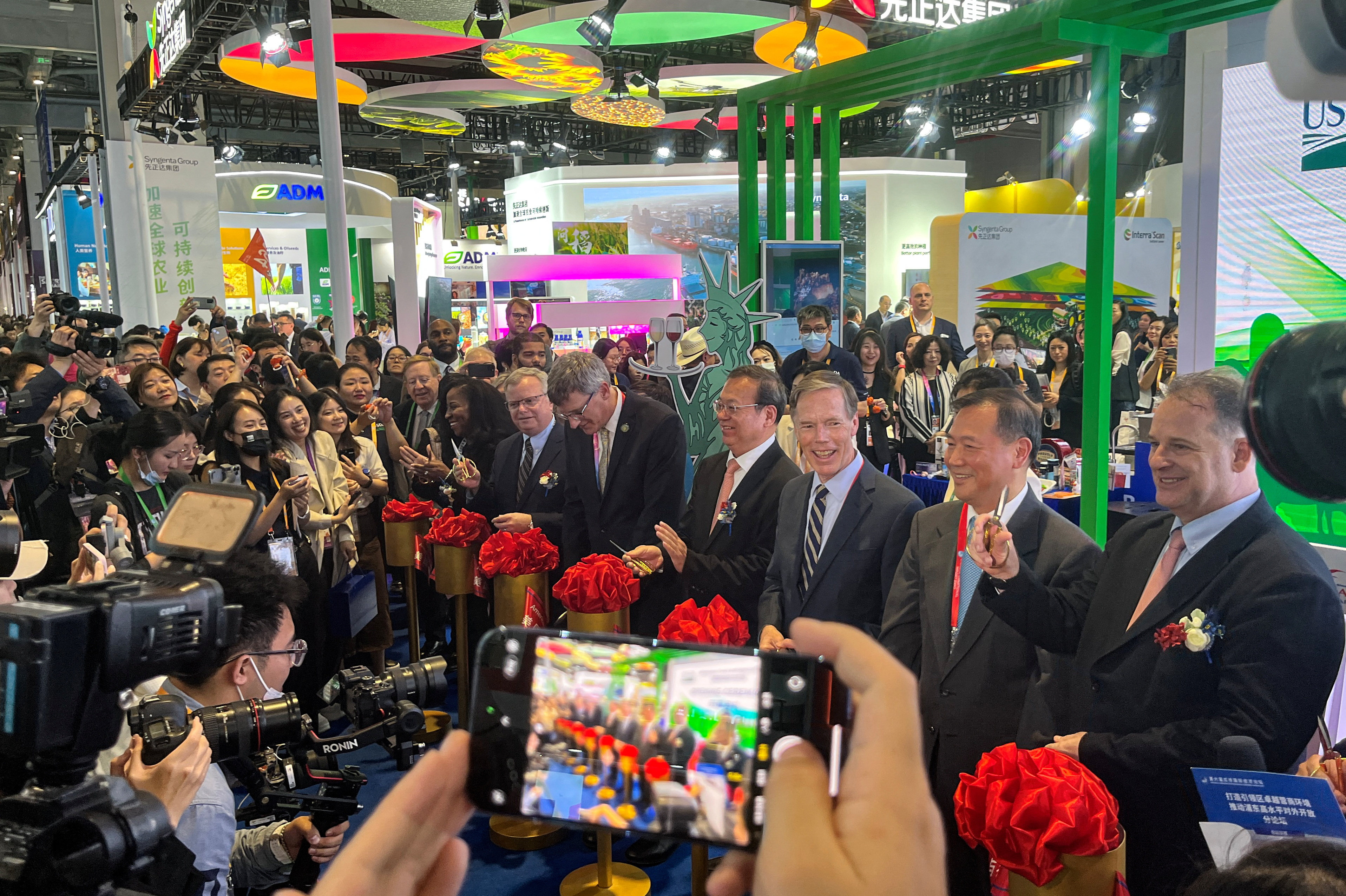 US ambassador to China Nicholas Burns (third right) at the China International Import Expo (CIIE) on Monday. Photo: Reuters