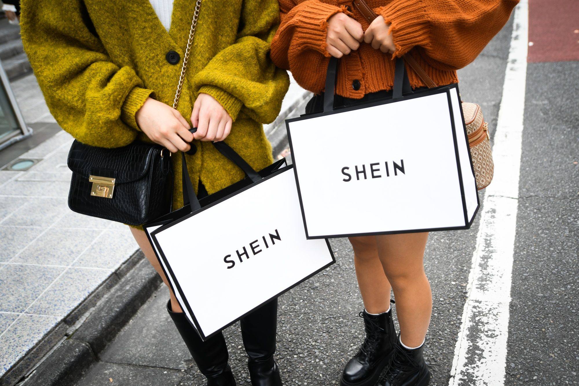 Customers hold Shein bags in Tokyo, Japan. Photo: Bloomberg