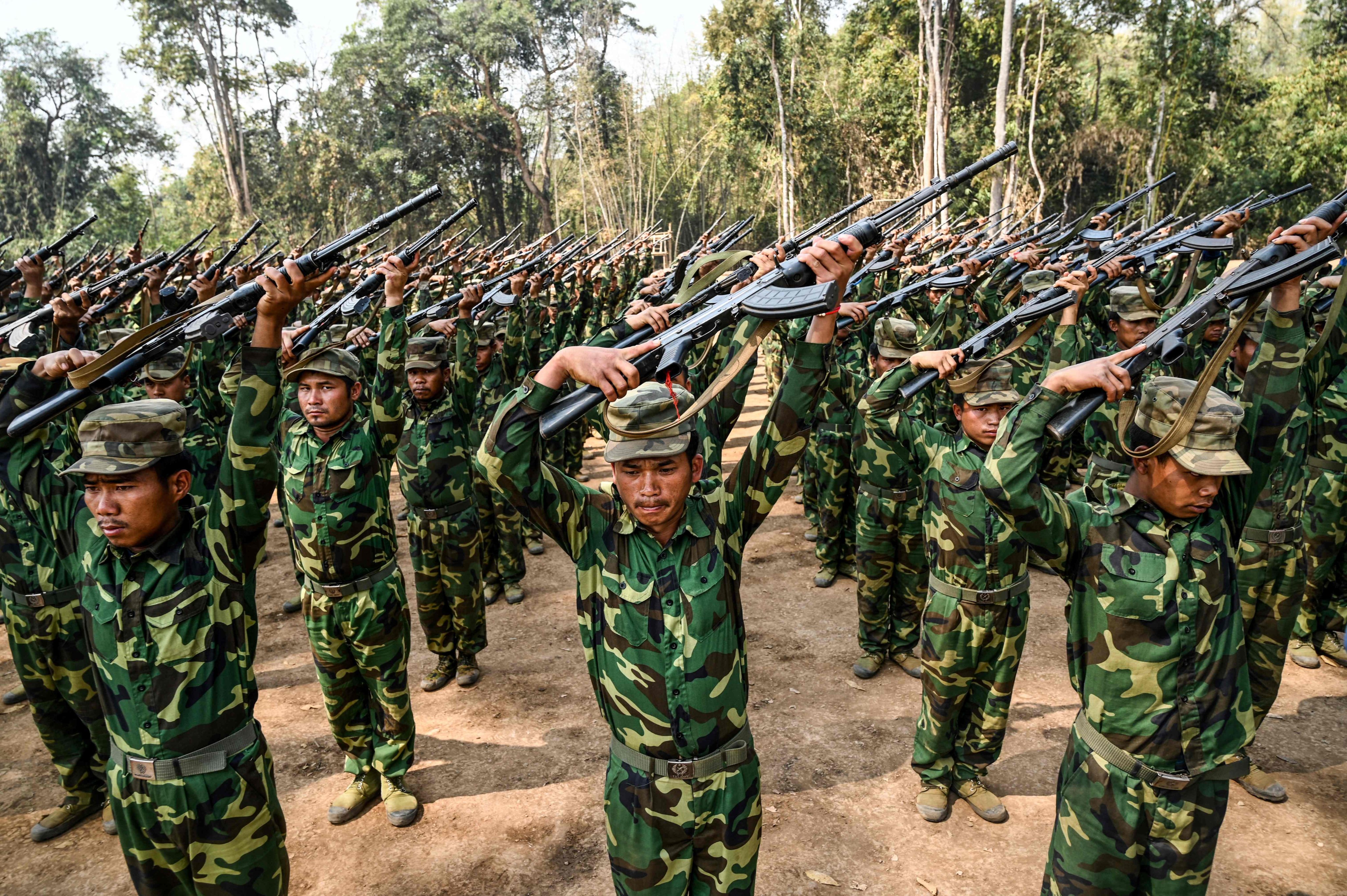 Members of the Ta’ang National Liberation Army train at their base camp in the forest in Myanmar’s northern Shan State. Photo: AFP